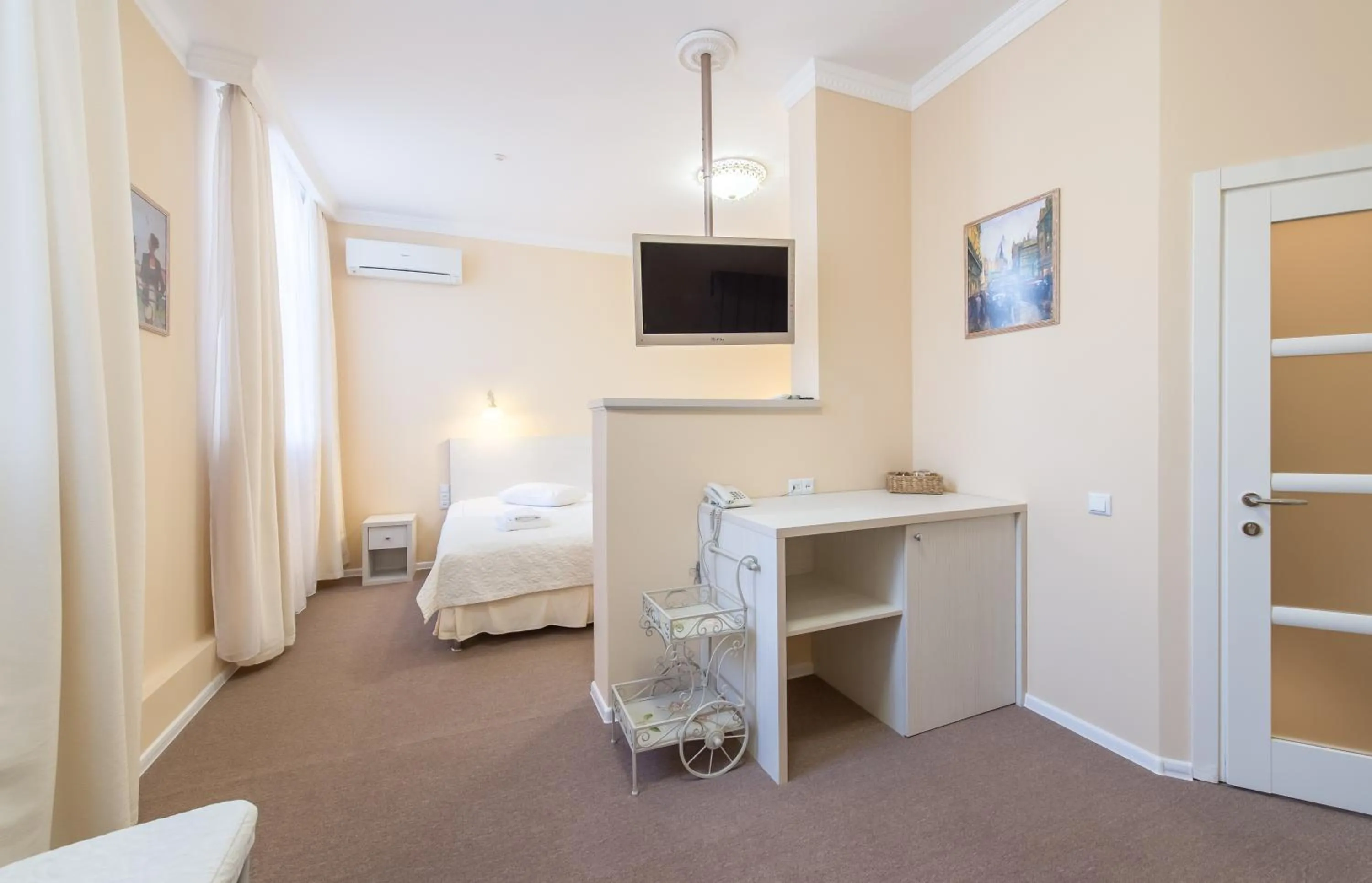 Photo of the whole room, Bed in light hotel & hub