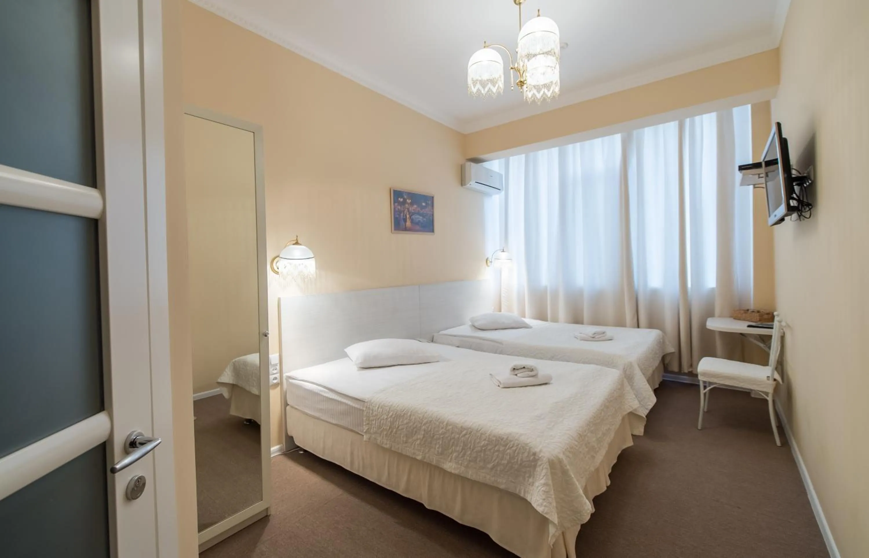Photo of the whole room, Bed in light hotel & hub