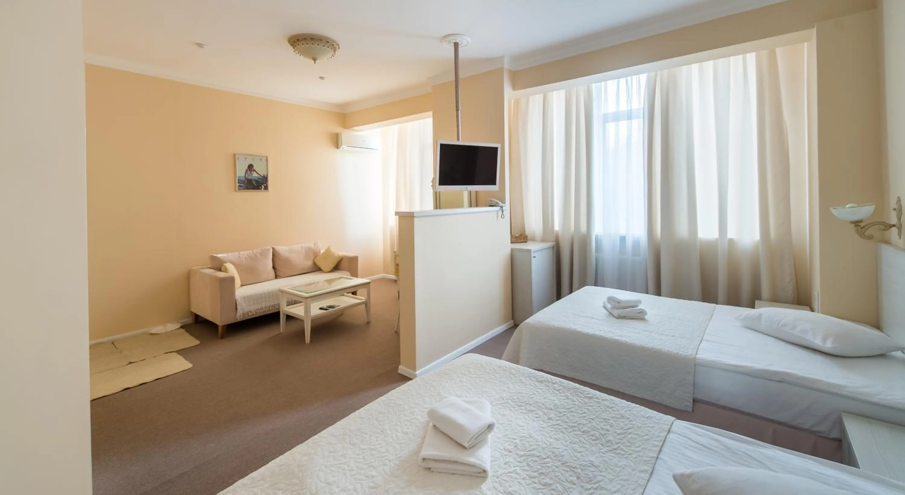 Photo of the whole room, Bed in light hotel & hub
