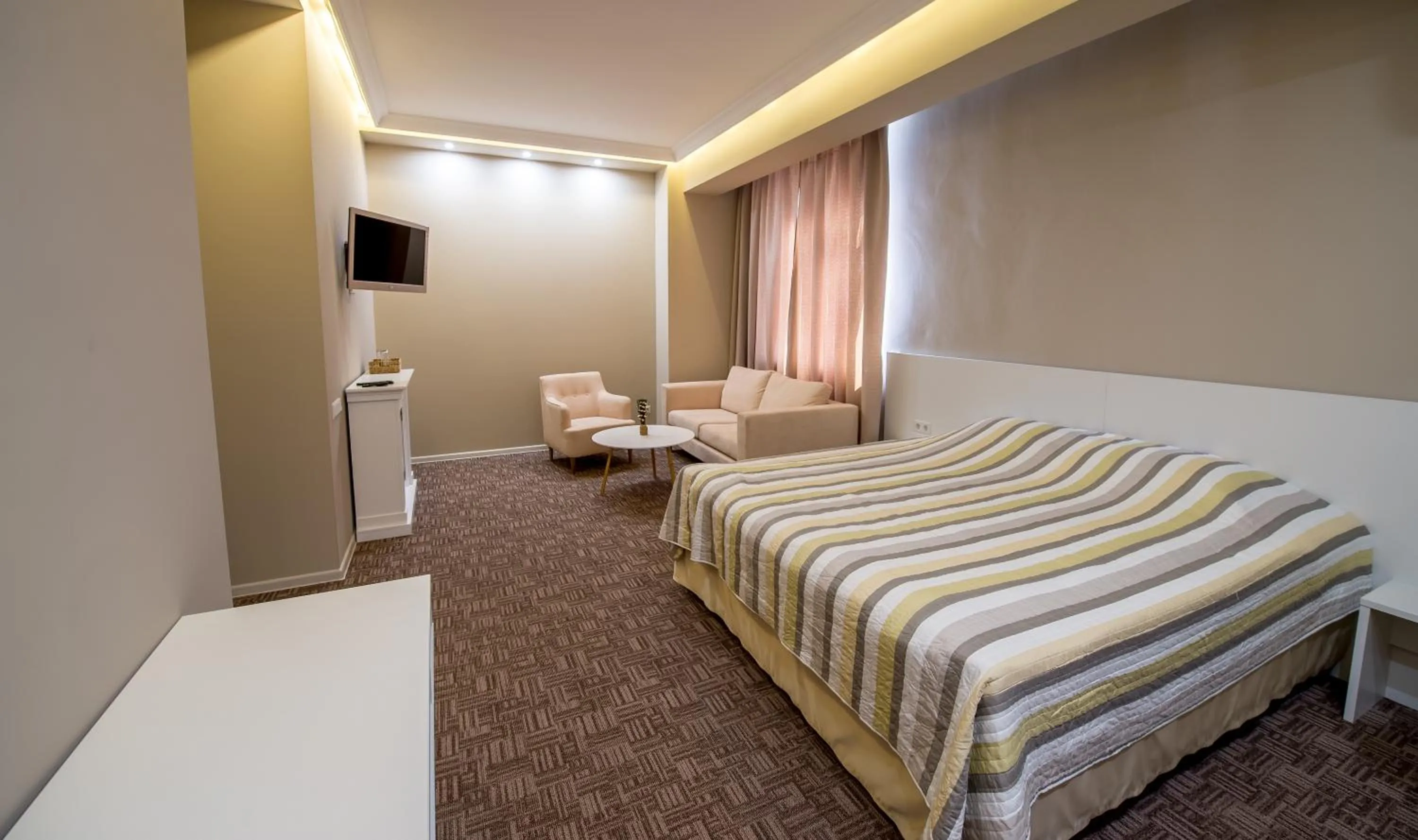 Photo of the whole room, Bed in light hotel & hub