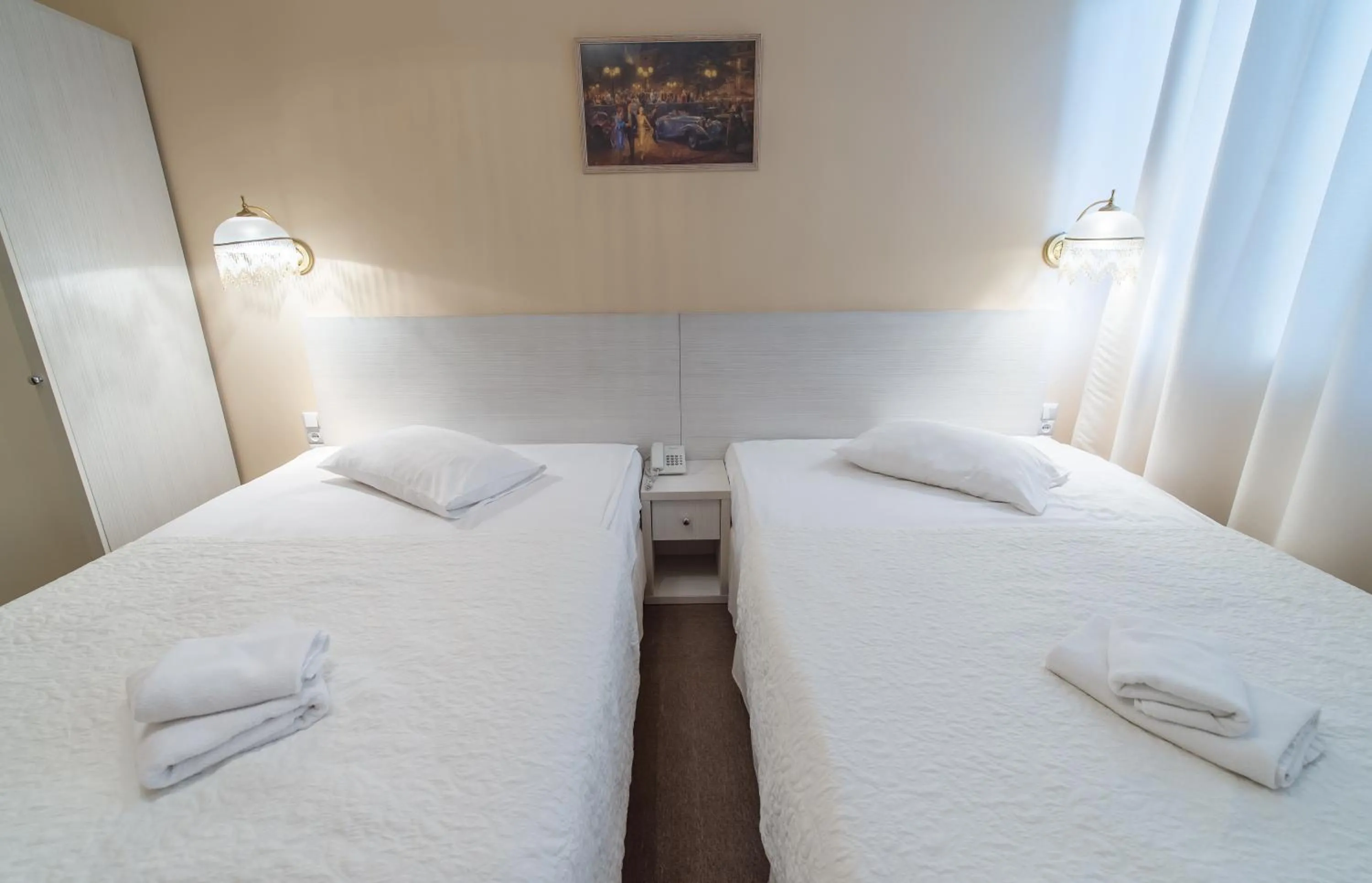 Photo of the whole room, Bed in light hotel & hub