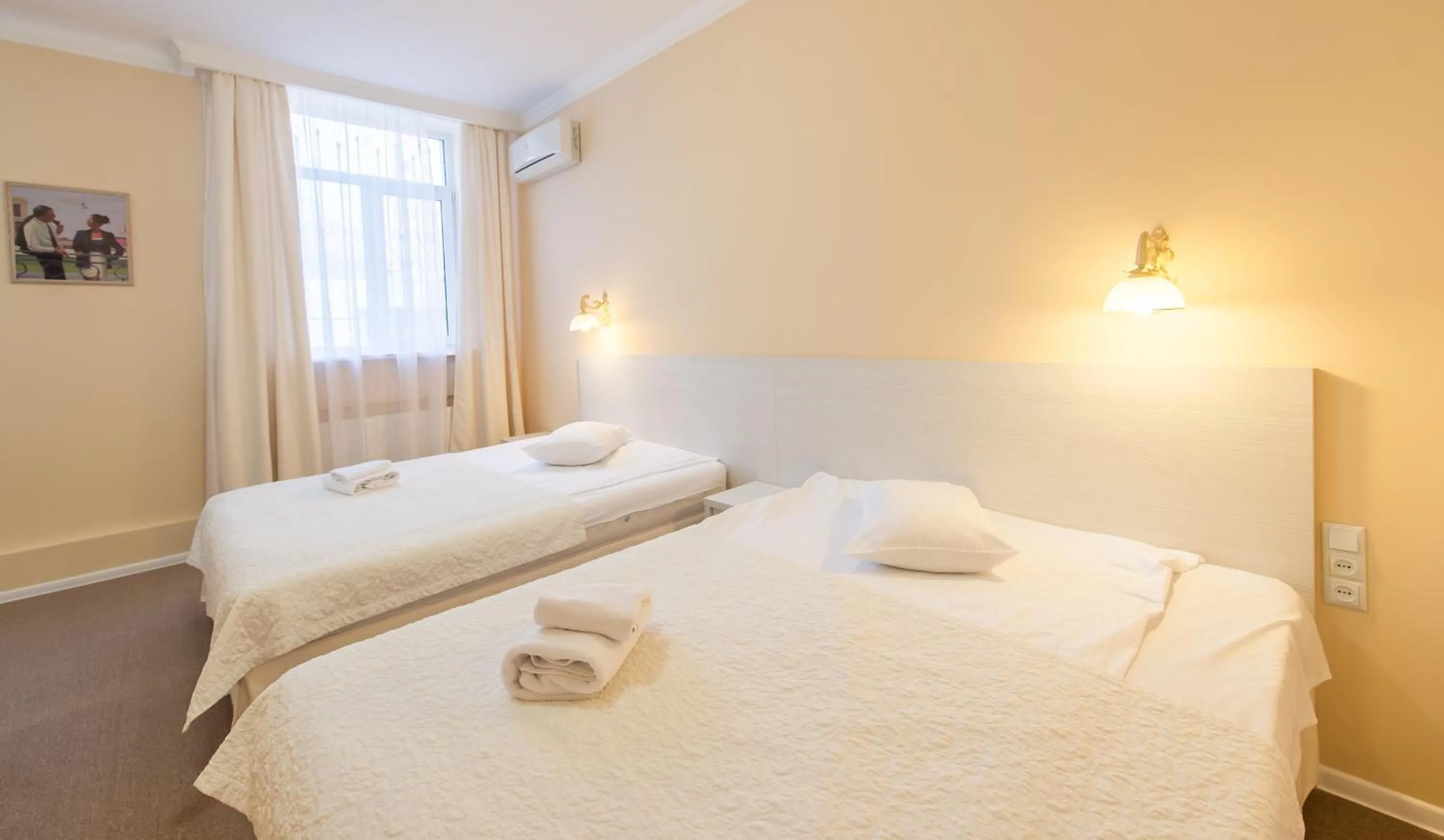 Photo of the whole room, Bed in light hotel & hub