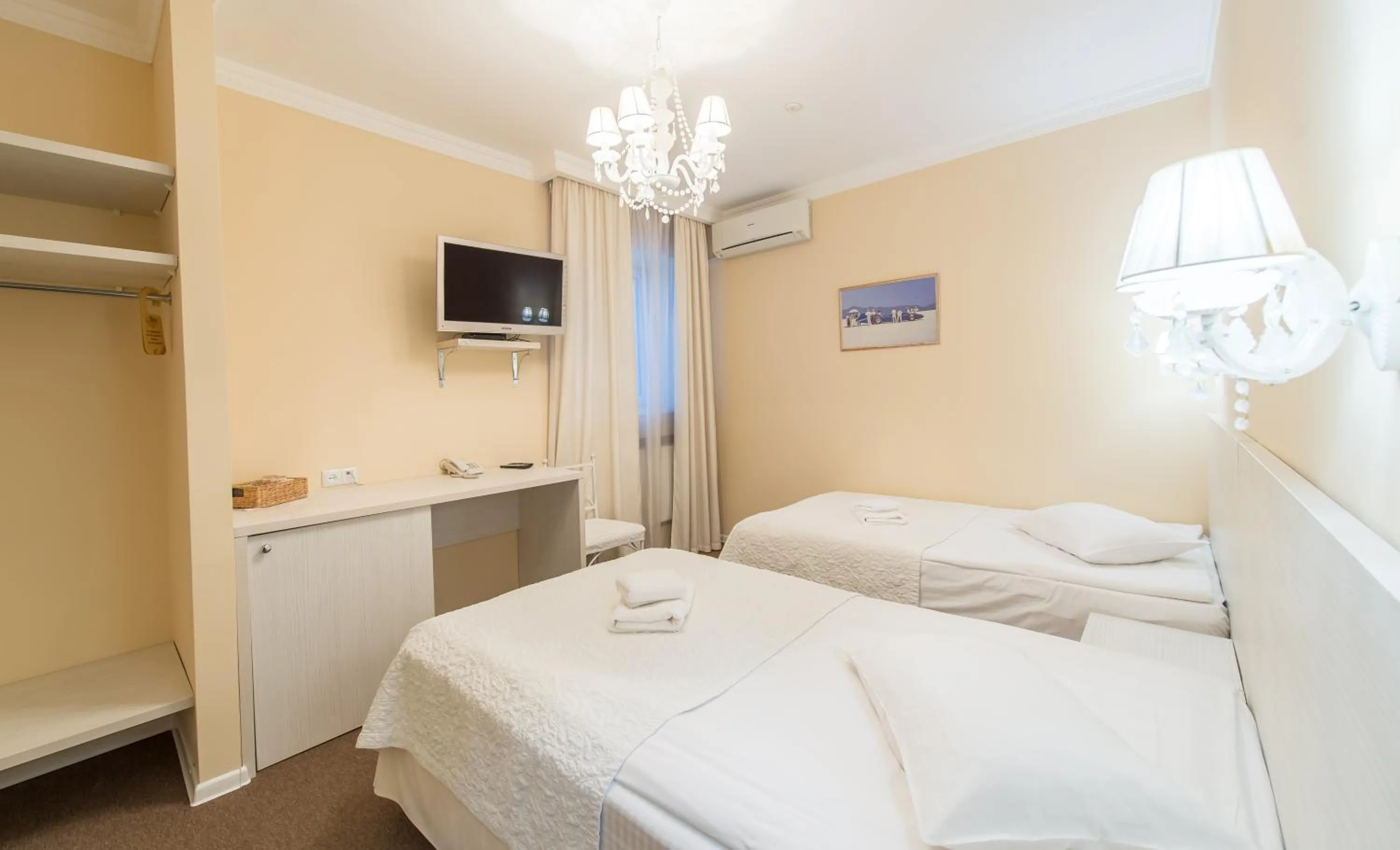 Photo of the whole room, Bed in light hotel & hub