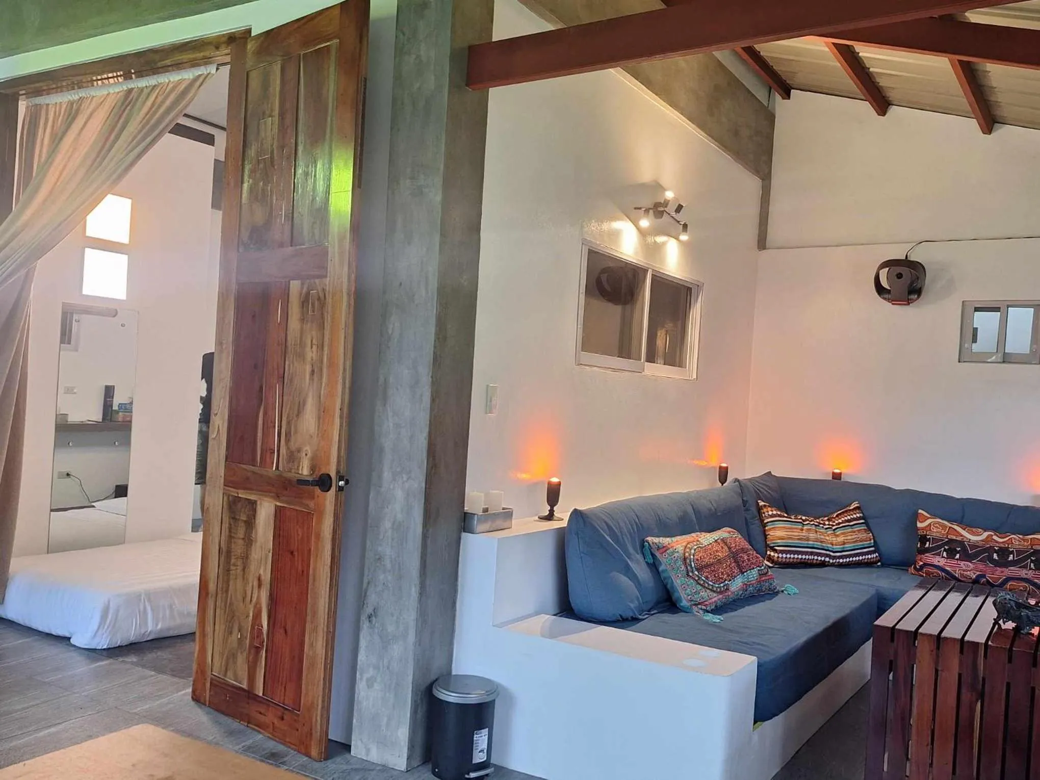 Seating area, Bed in SomeWhere Else Boutique Resort