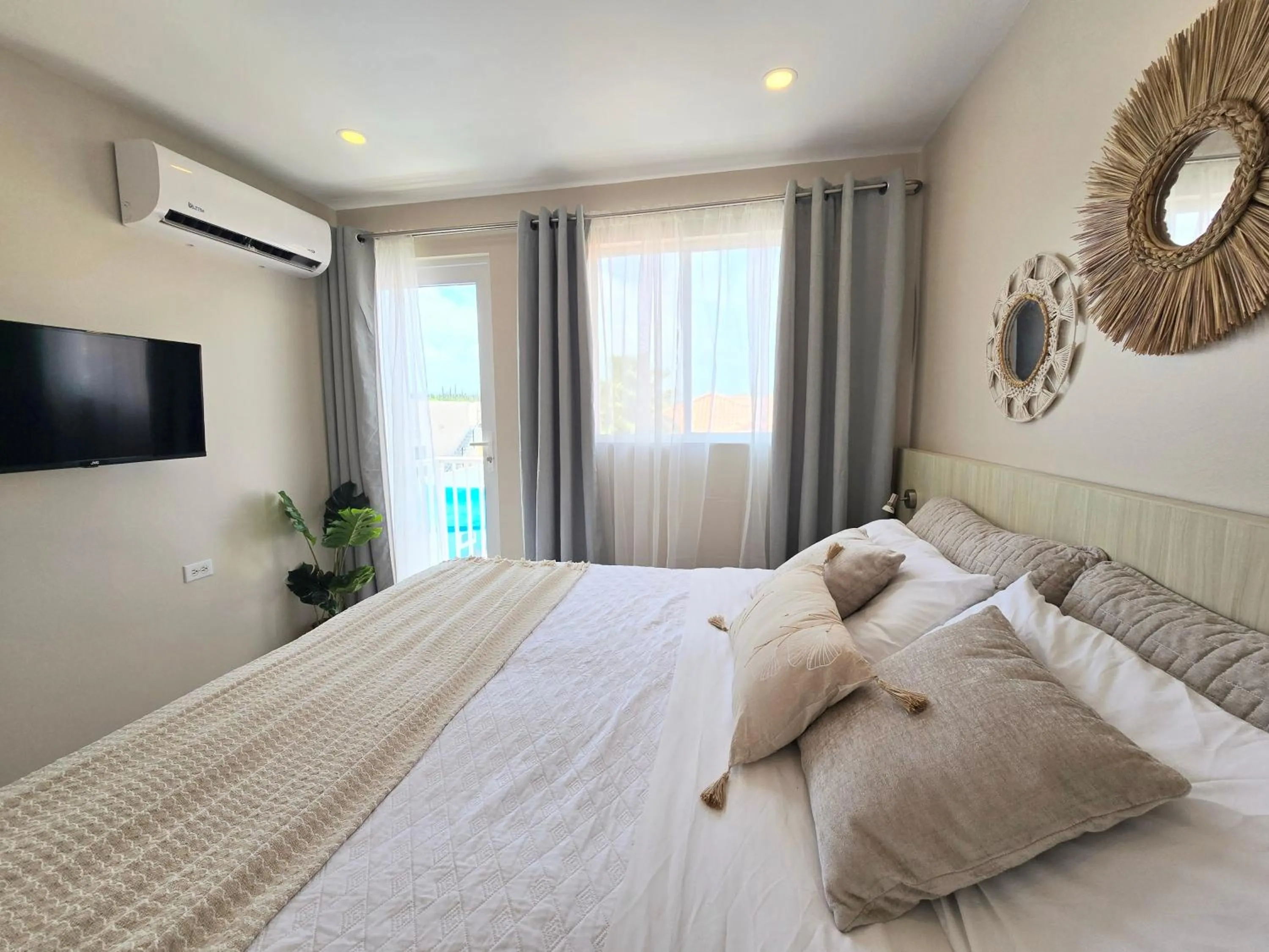 TV and multimedia, Bed in Rooi Santo Residence