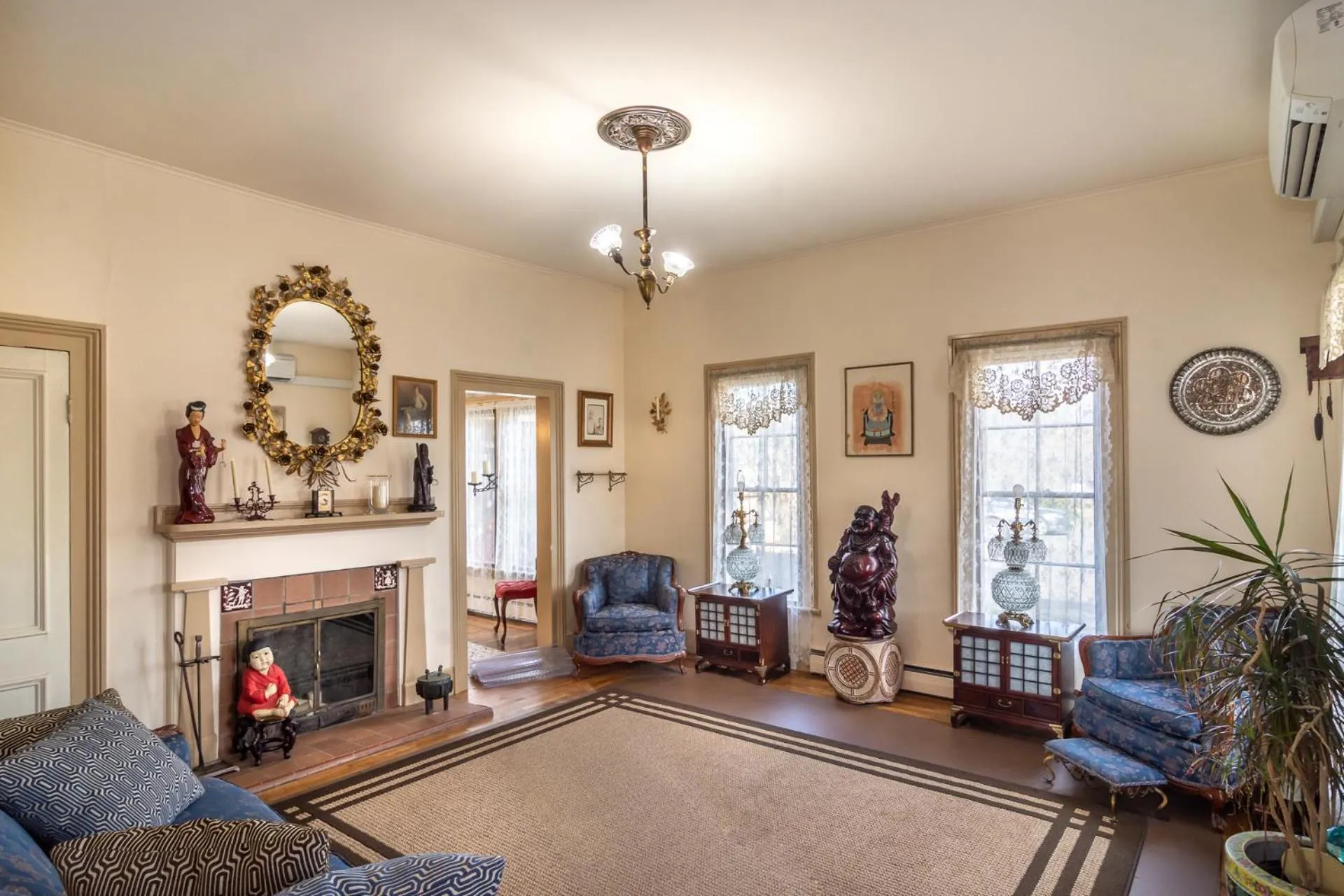 Living room in HISTORICAL JOHN RAST HOUSE circa 1875