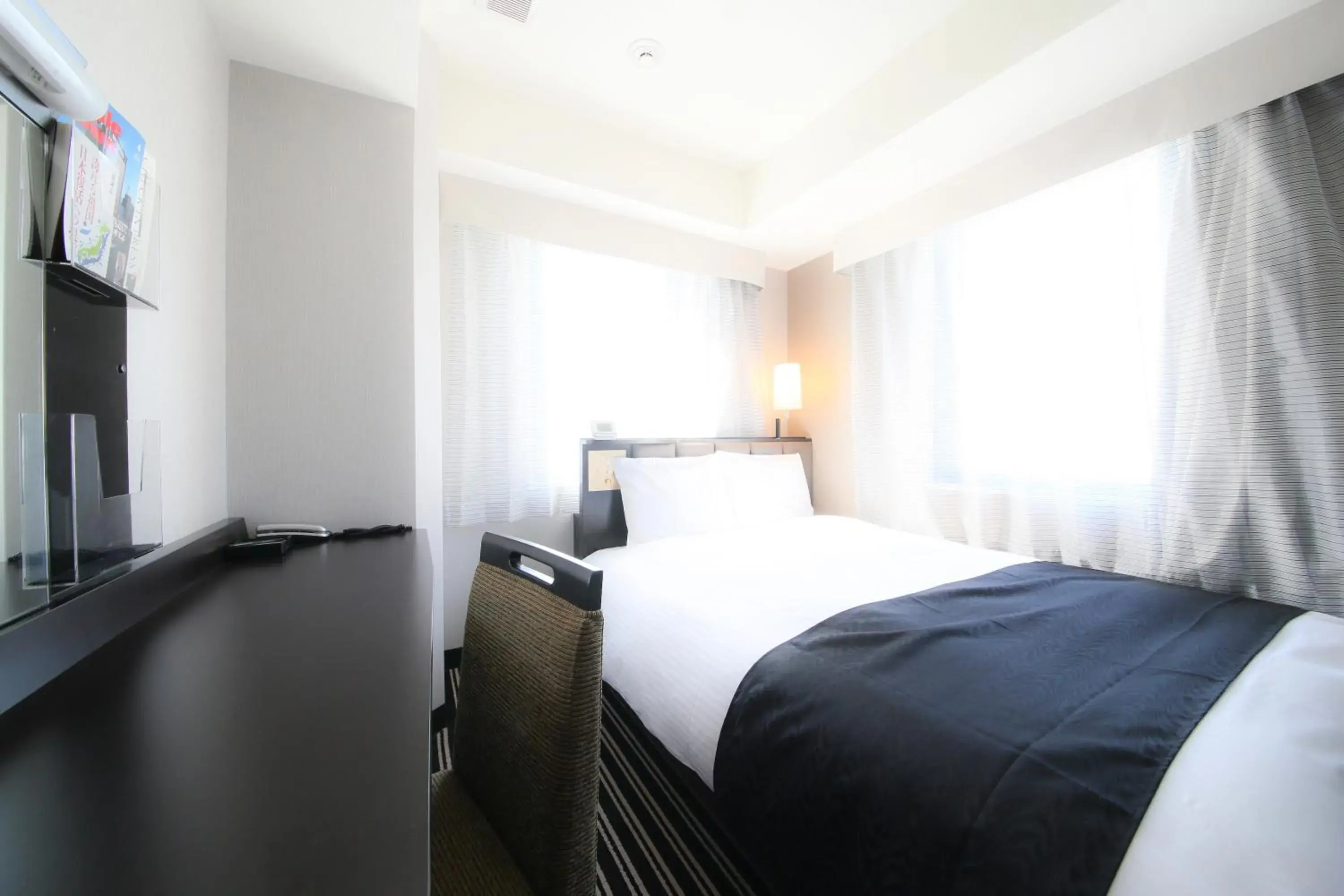 Bed in APA Hotel Ginza Takaracho Tokyo Eki Yaesu Minamiguchi Bed in APA Hotel Ginza Takaracho Tokyo Eki Yaesu Minamiguchi