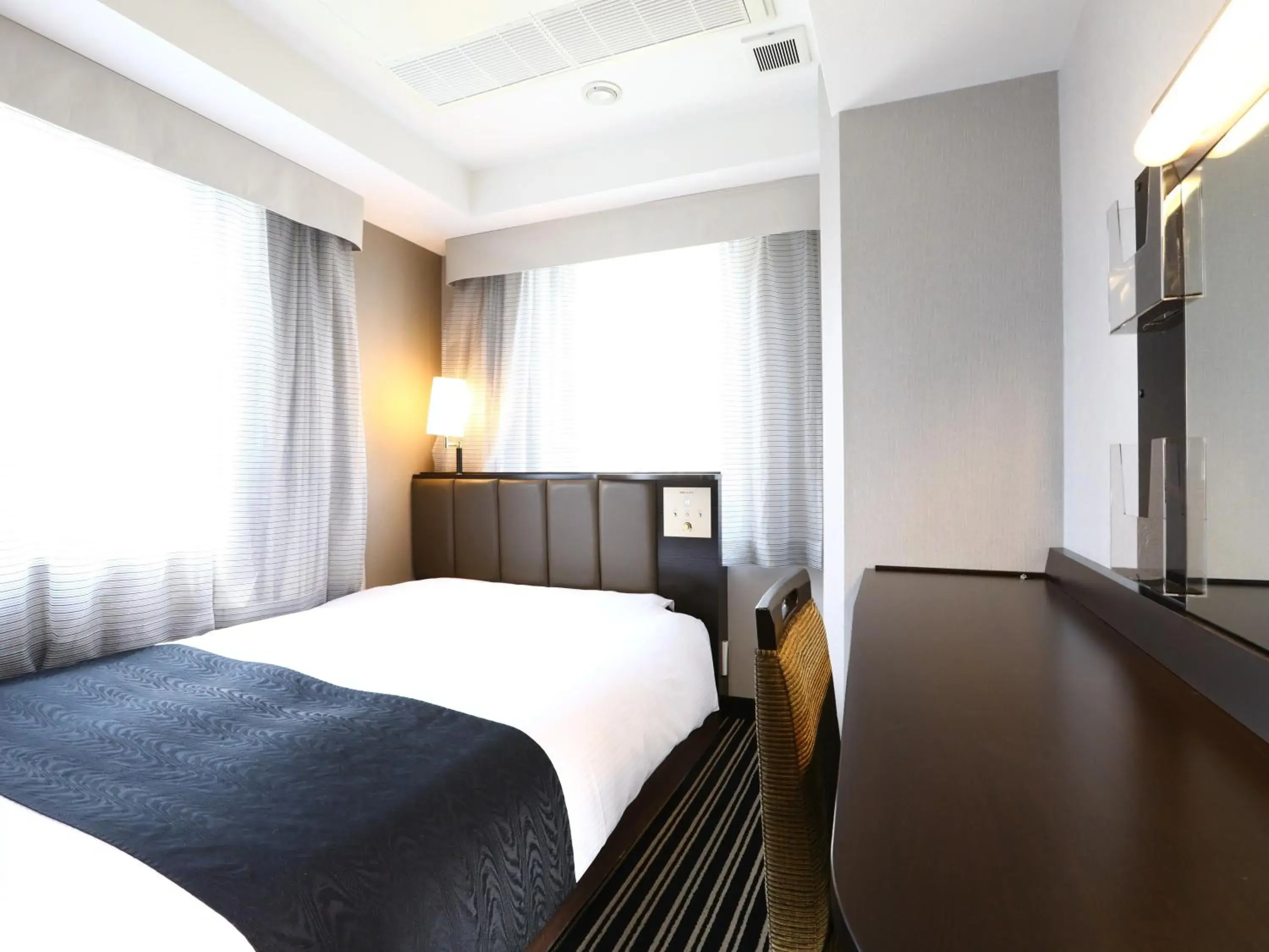 Bed in APA Hotel Ginza Takaracho Tokyo Eki Yaesu Minamiguchi Bed in APA Hotel Ginza Takaracho Tokyo Eki Yaesu Minamiguchi