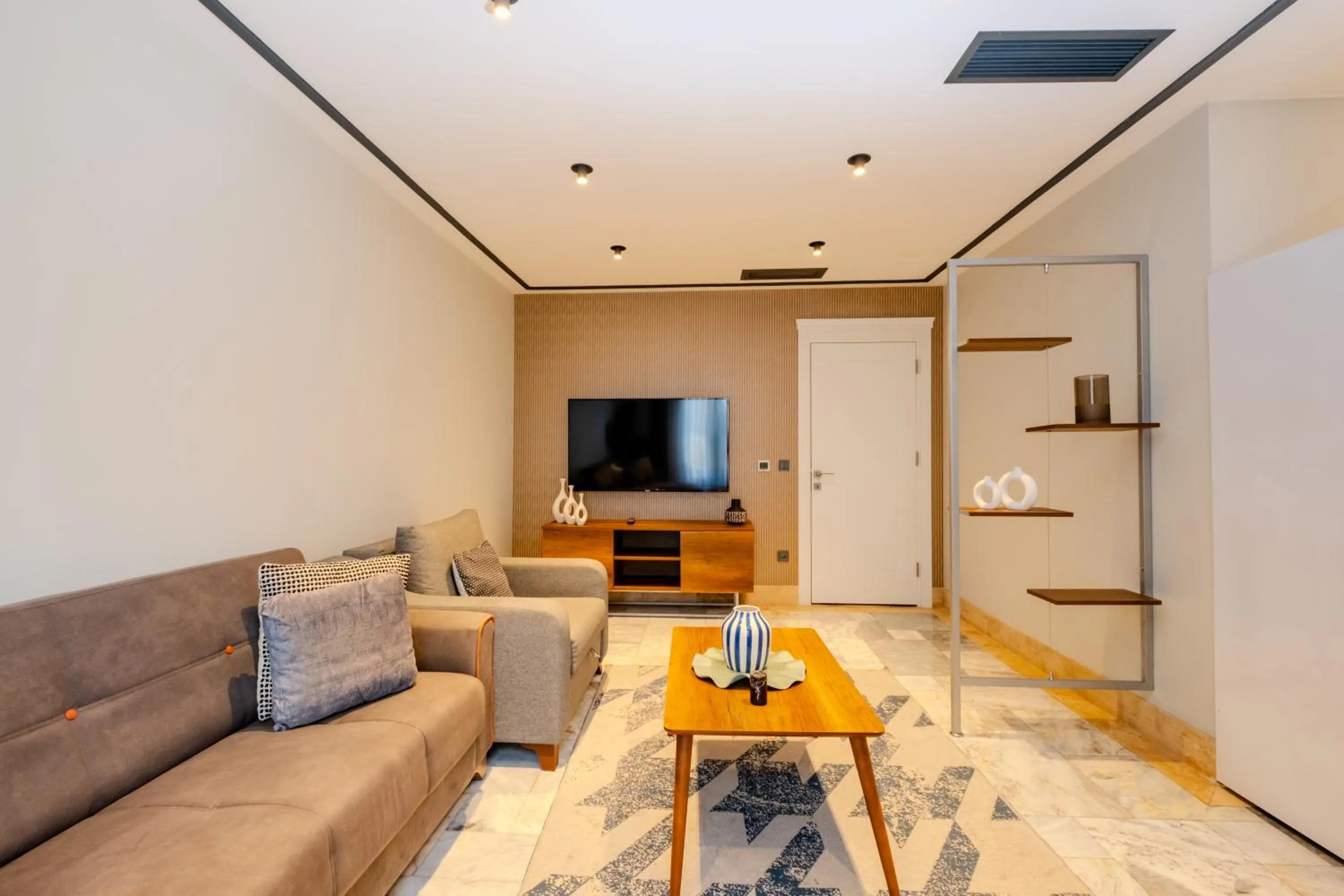 Communal lounge/ TV room in Home Of Istanbul