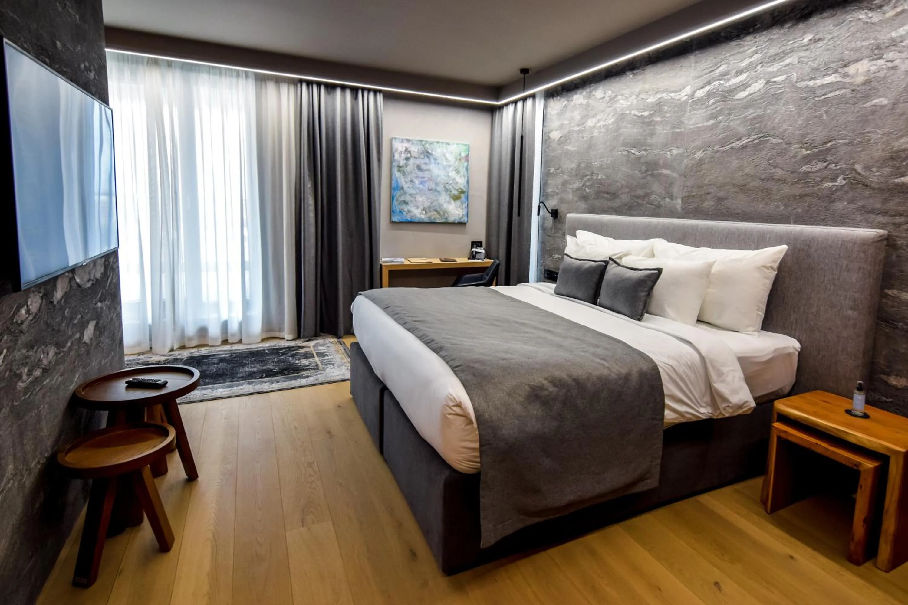 Bed in Qosmo Brasov Hotel