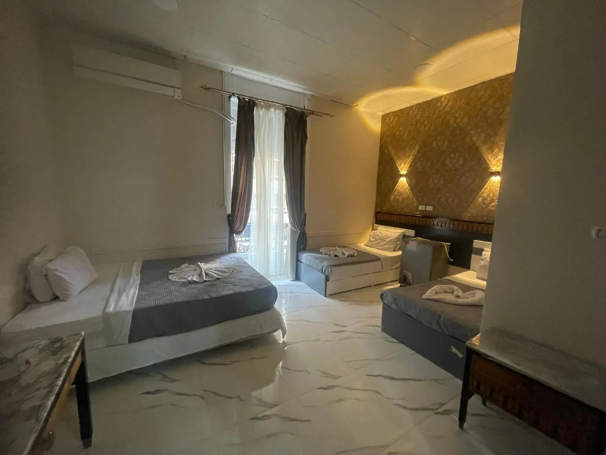 Quadruple Room with Private Bathroom in One Season Cairo Quadruple Room with Private Bathroom in One Season Cairo
