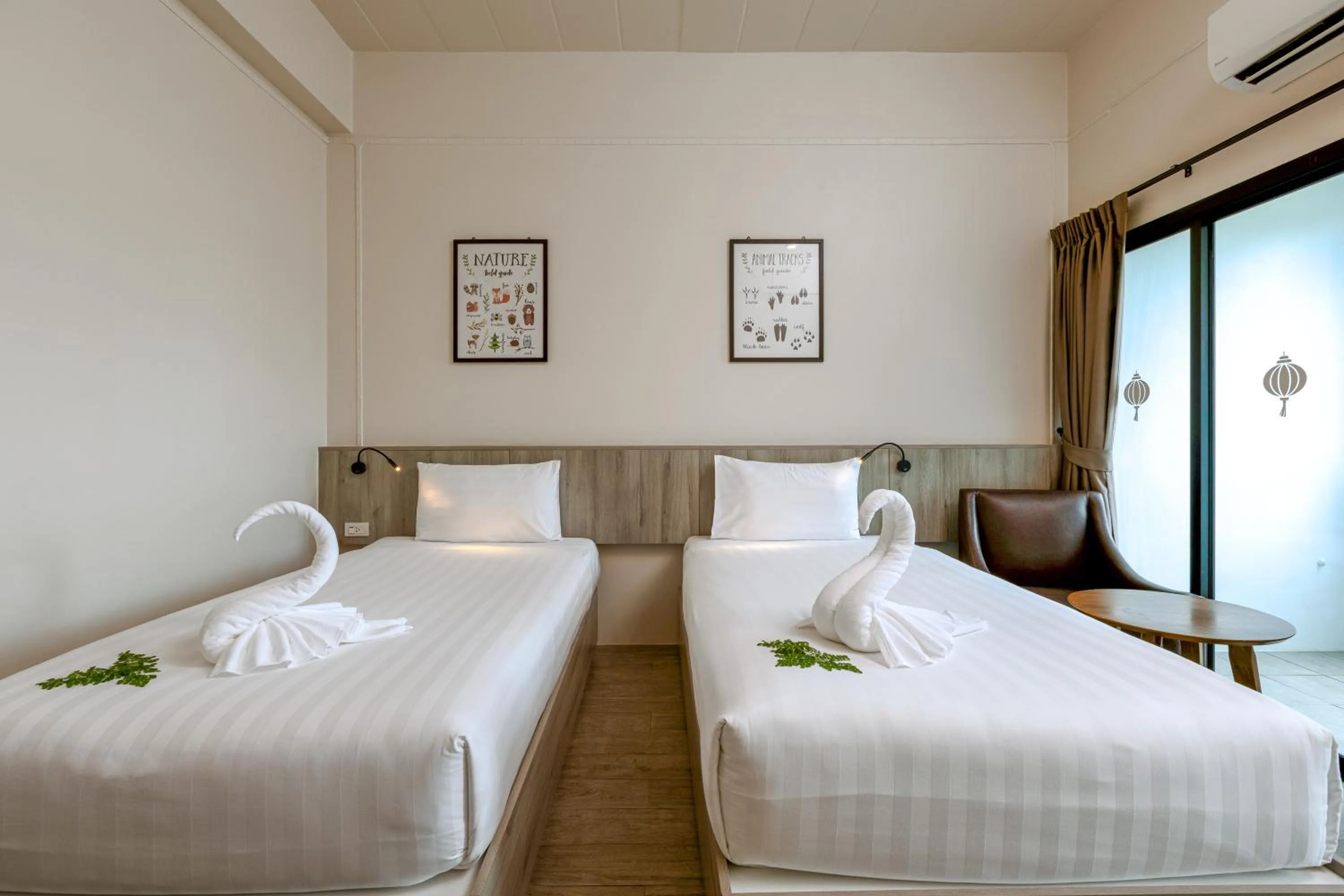 Bed in Ang Pao Hotel Phuket