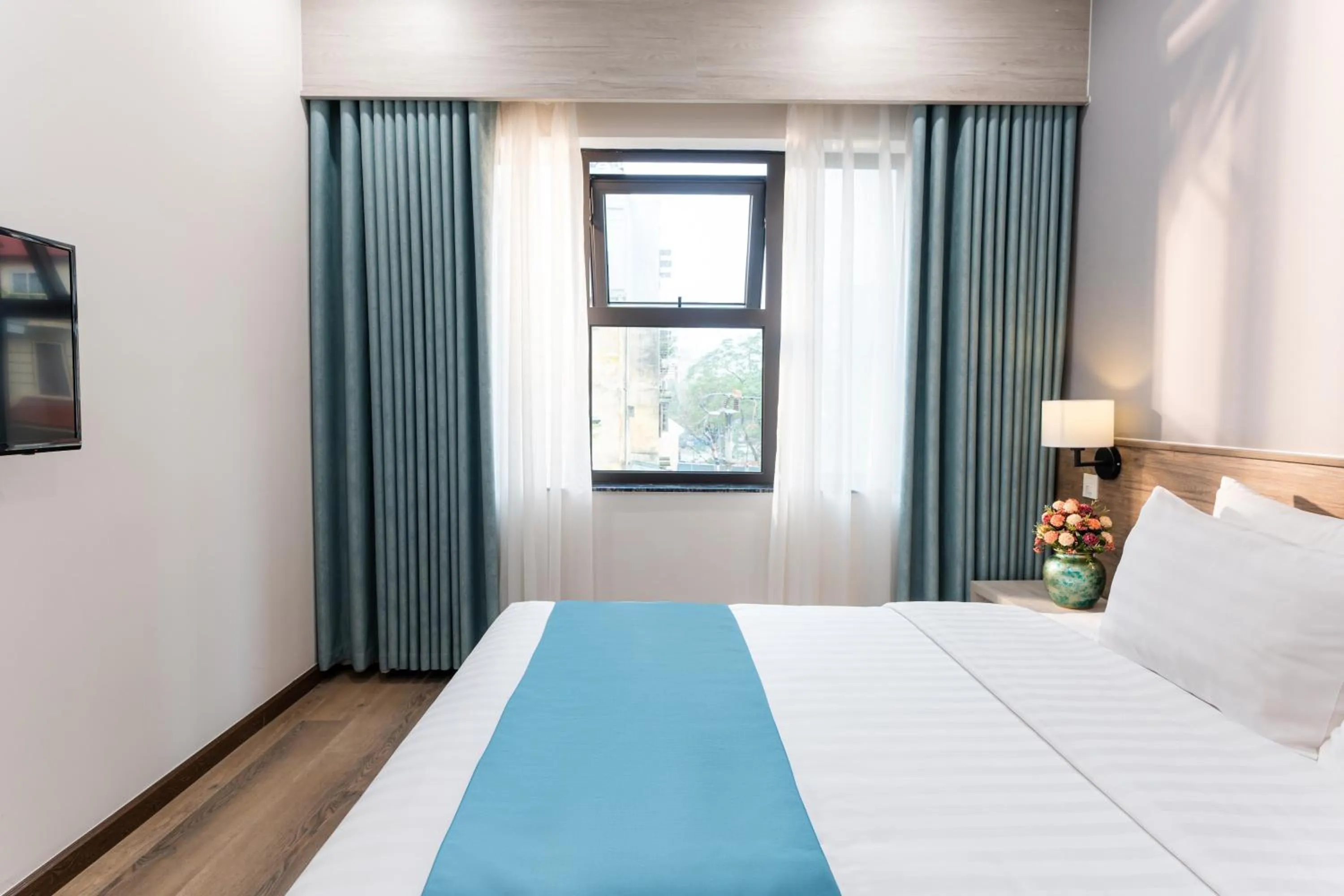 Photo of the whole room, Bed in Capital Garden Hotel