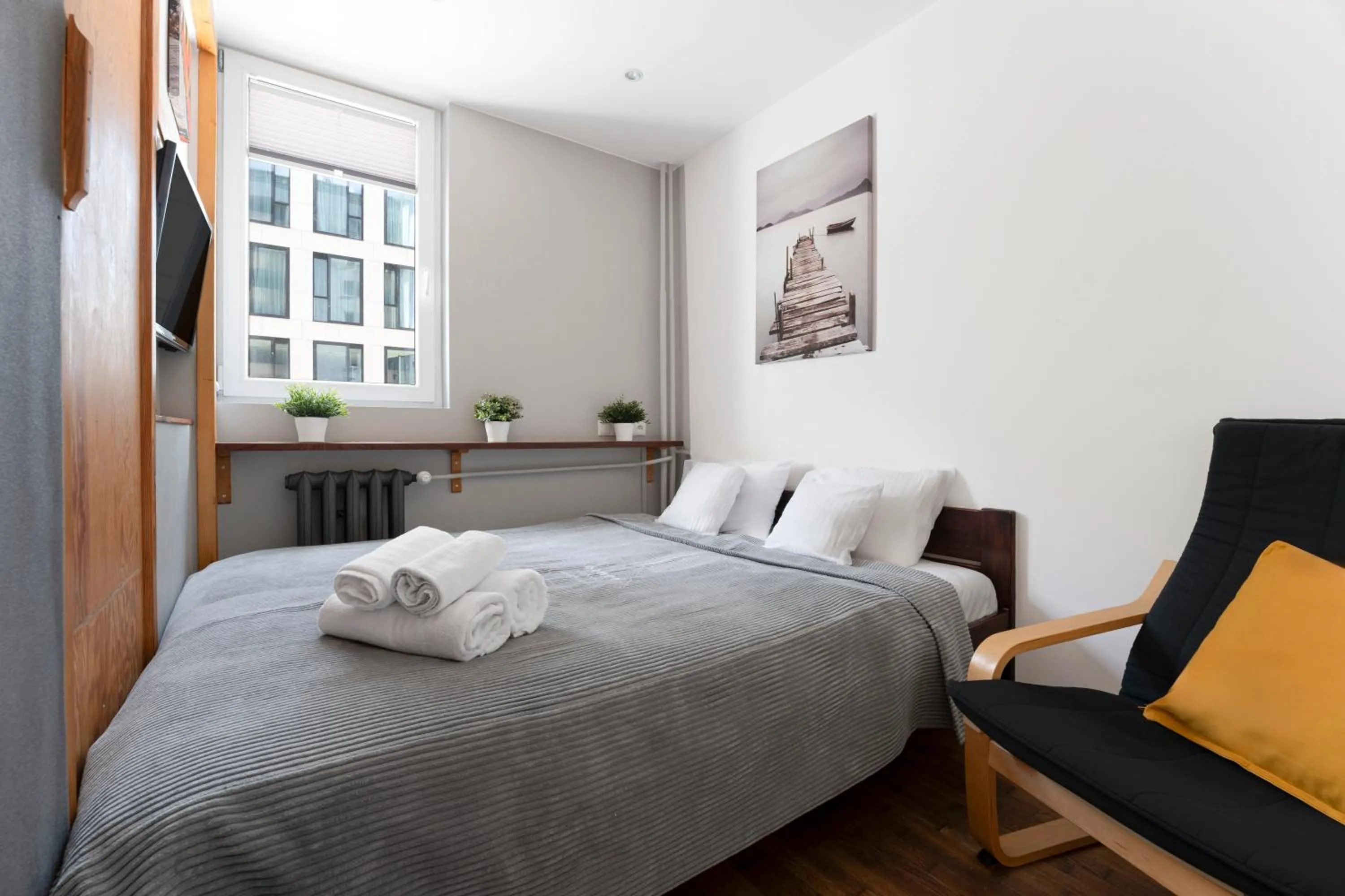 Bed in oompH Warsaw Central Apartment