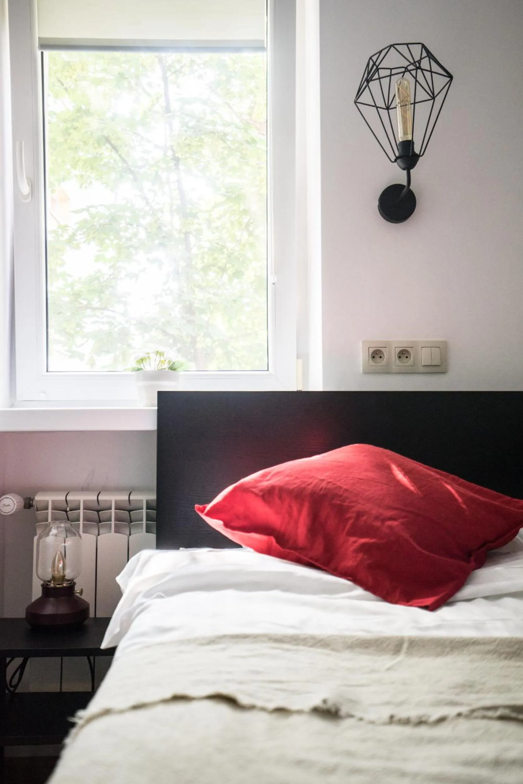 Bed in oompH Warsaw Central Apartment