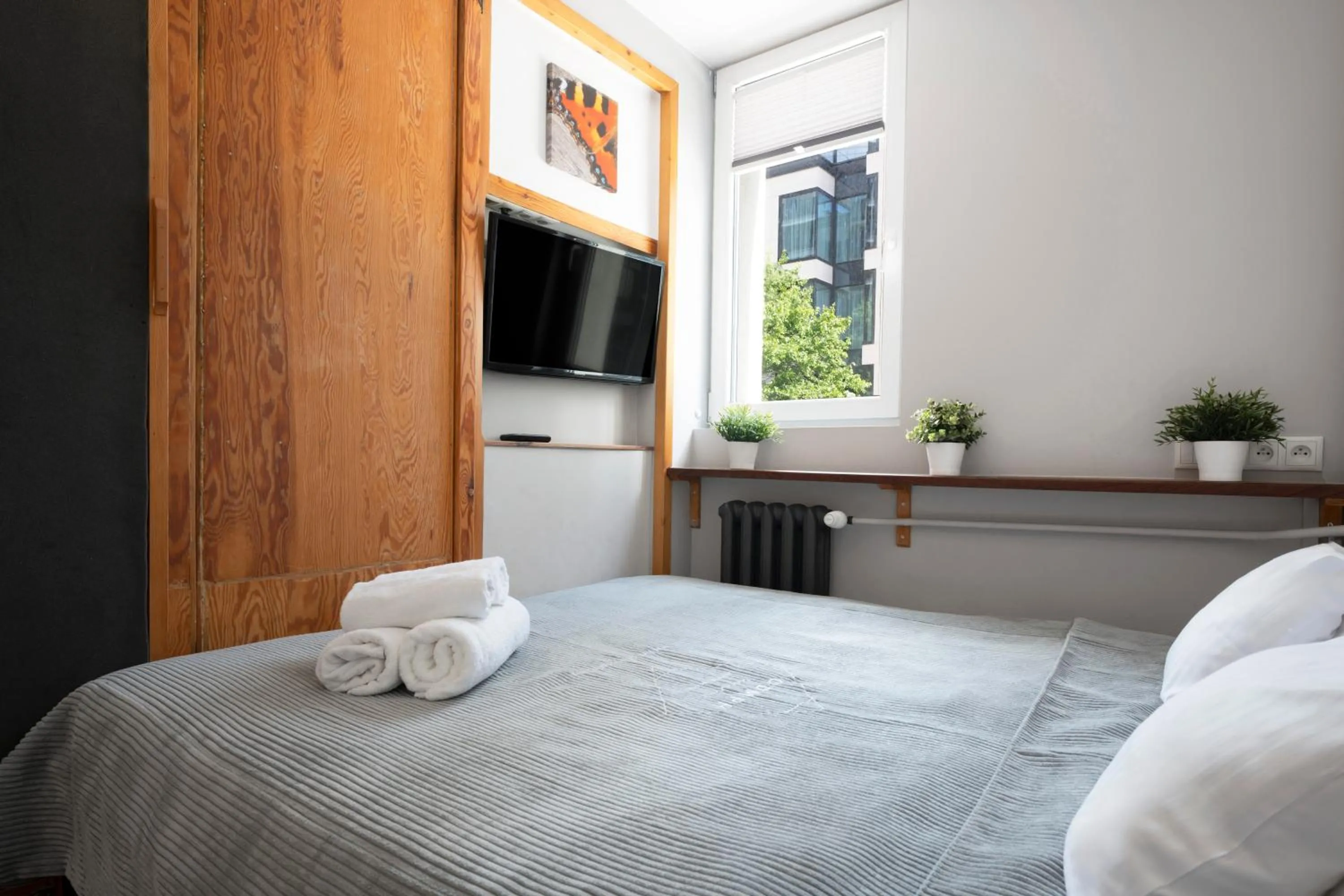 Bed in oompH Warsaw Central Apartment