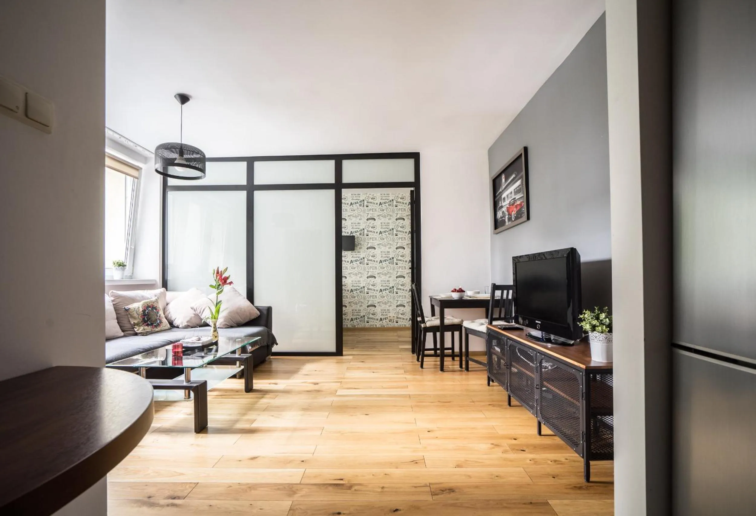 TV and multimedia in oompH Warsaw Central Apartment