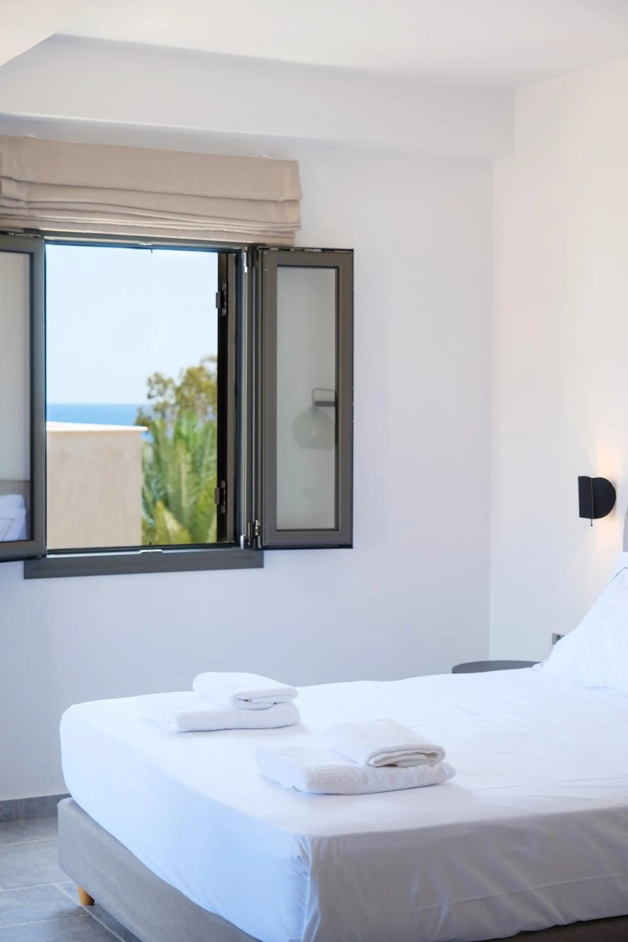 Bed in Margo Beach Hotel