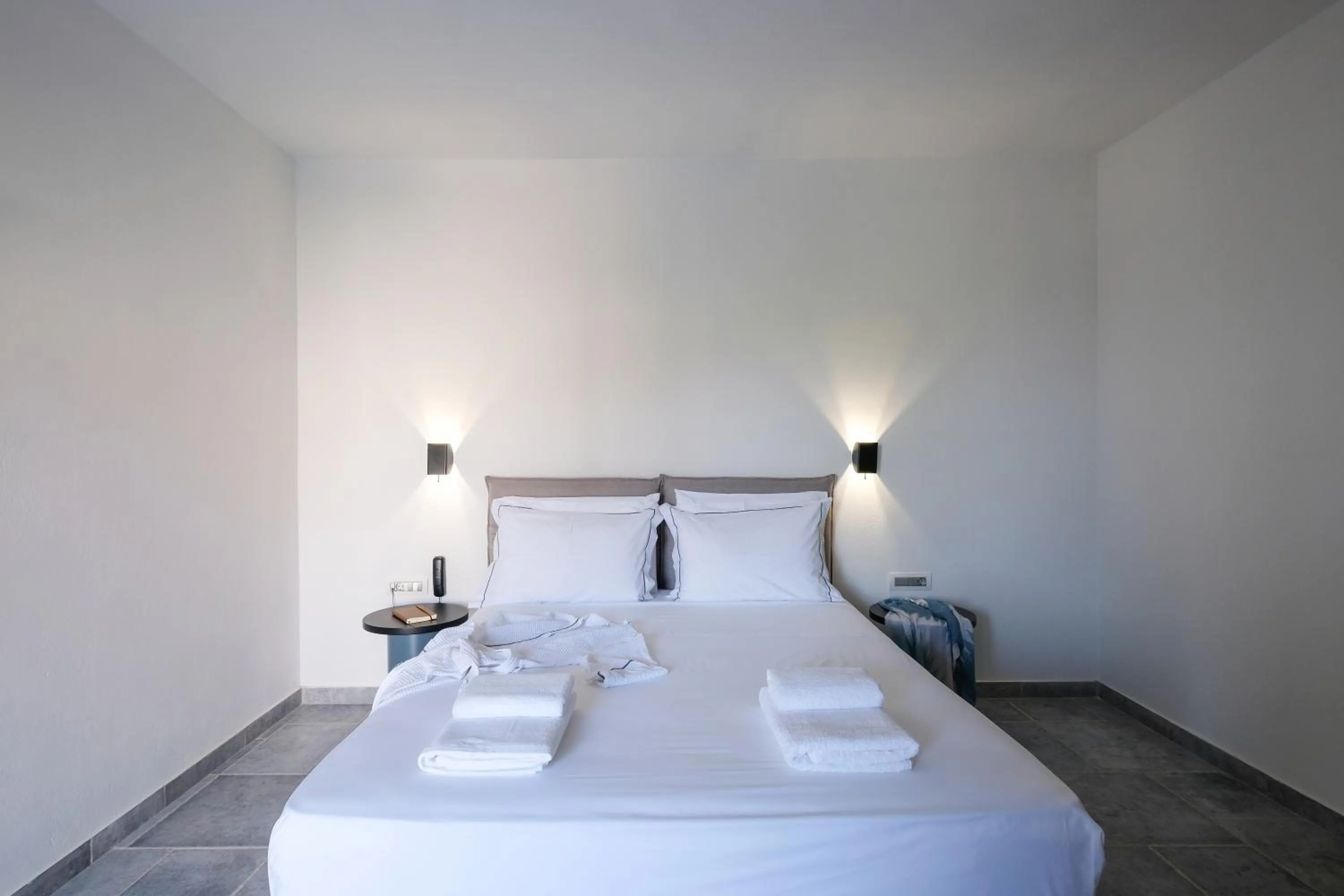 Bed in Margo Beach Hotel