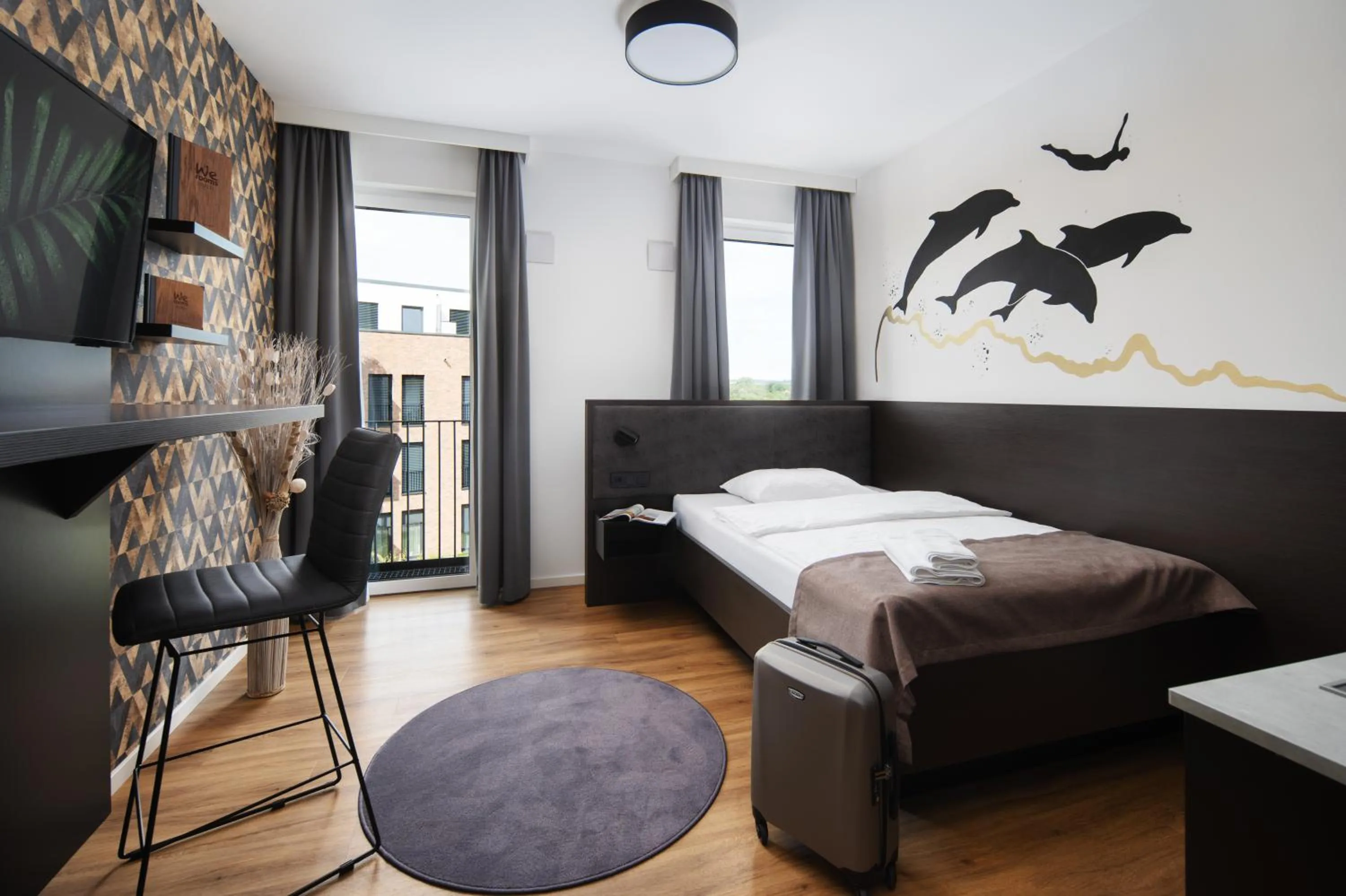 Bed in We rooms Hotel