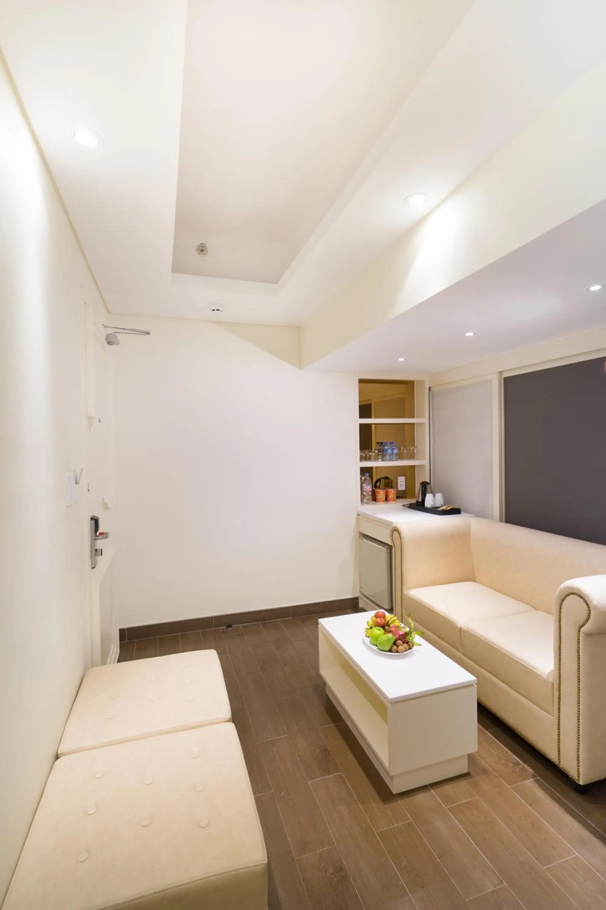 Living room, Bed in Empress Hotel Ho Chi Minh City