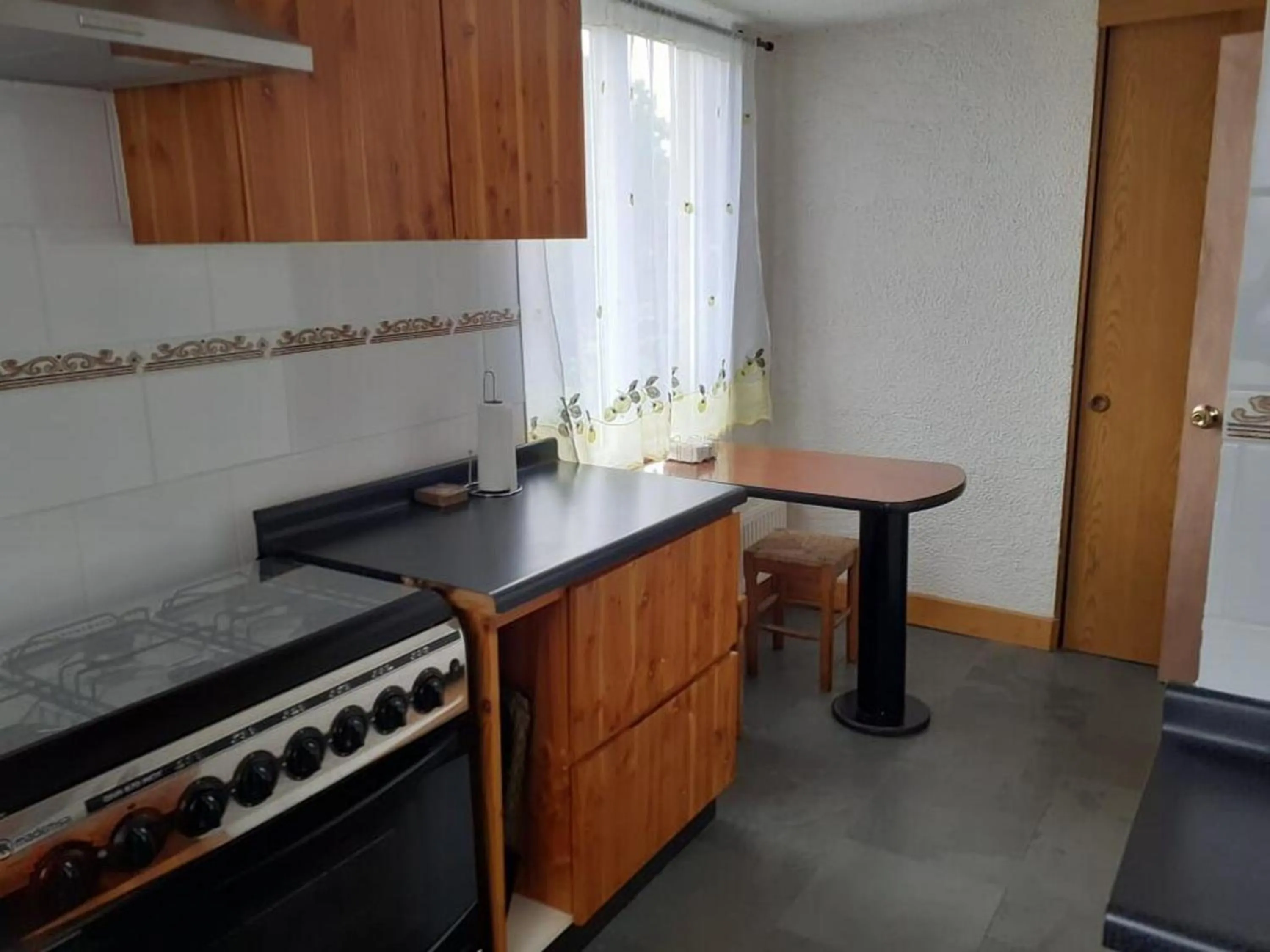 Kitchen or kitchenette in Departamento en el Centro de Pucón, Hermosa vista al lago !!