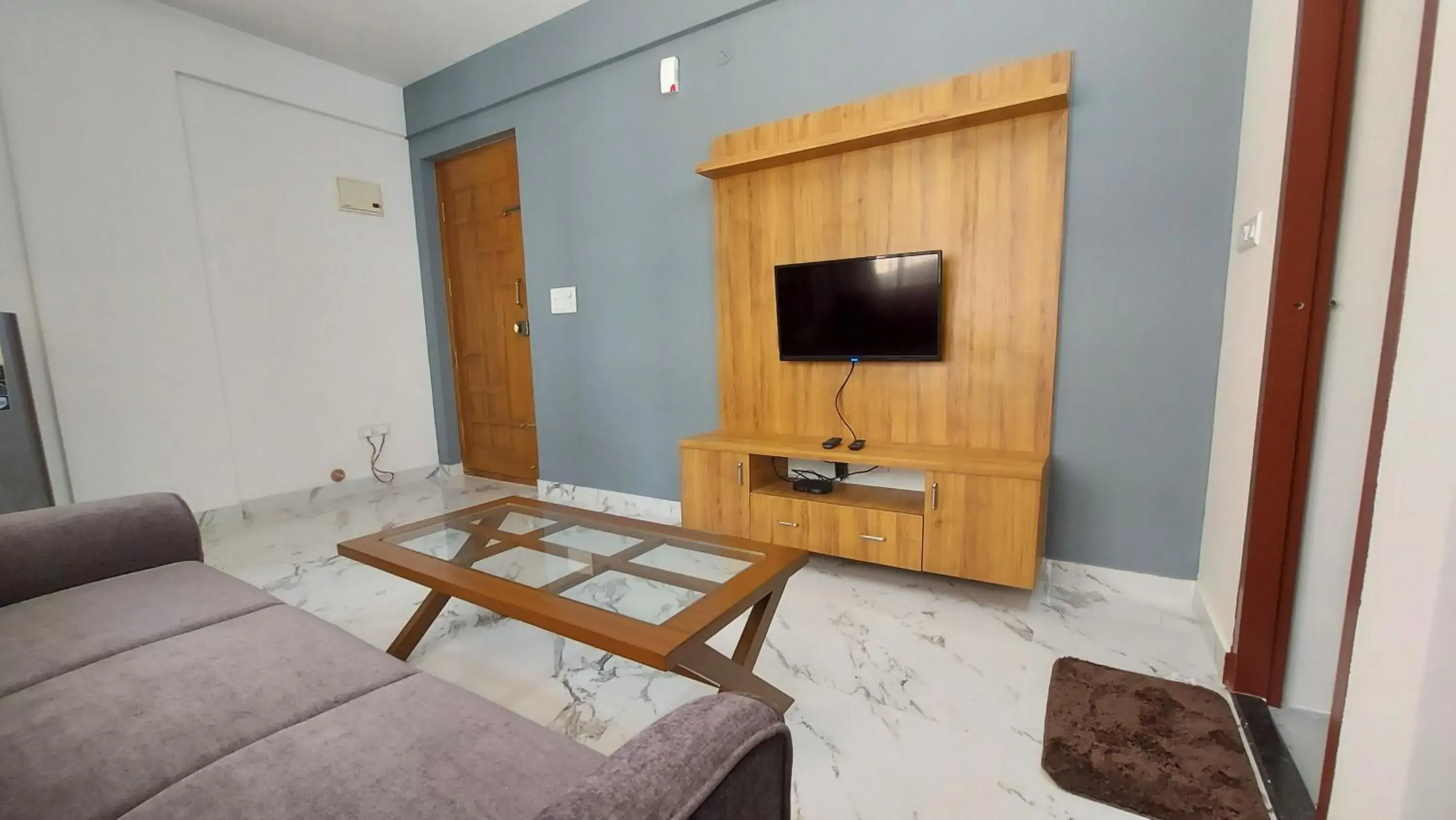 Living room in Tranquil Serviced Apartments - HSR Layout Living room in Tranquil Serviced Apartments - HSR Layout