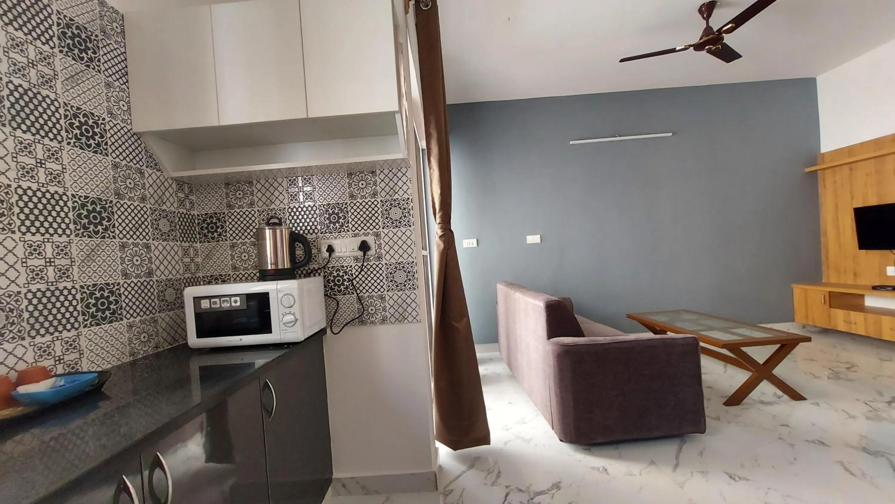 TV and multimedia in Tranquil Serviced Apartments - HSR Layout