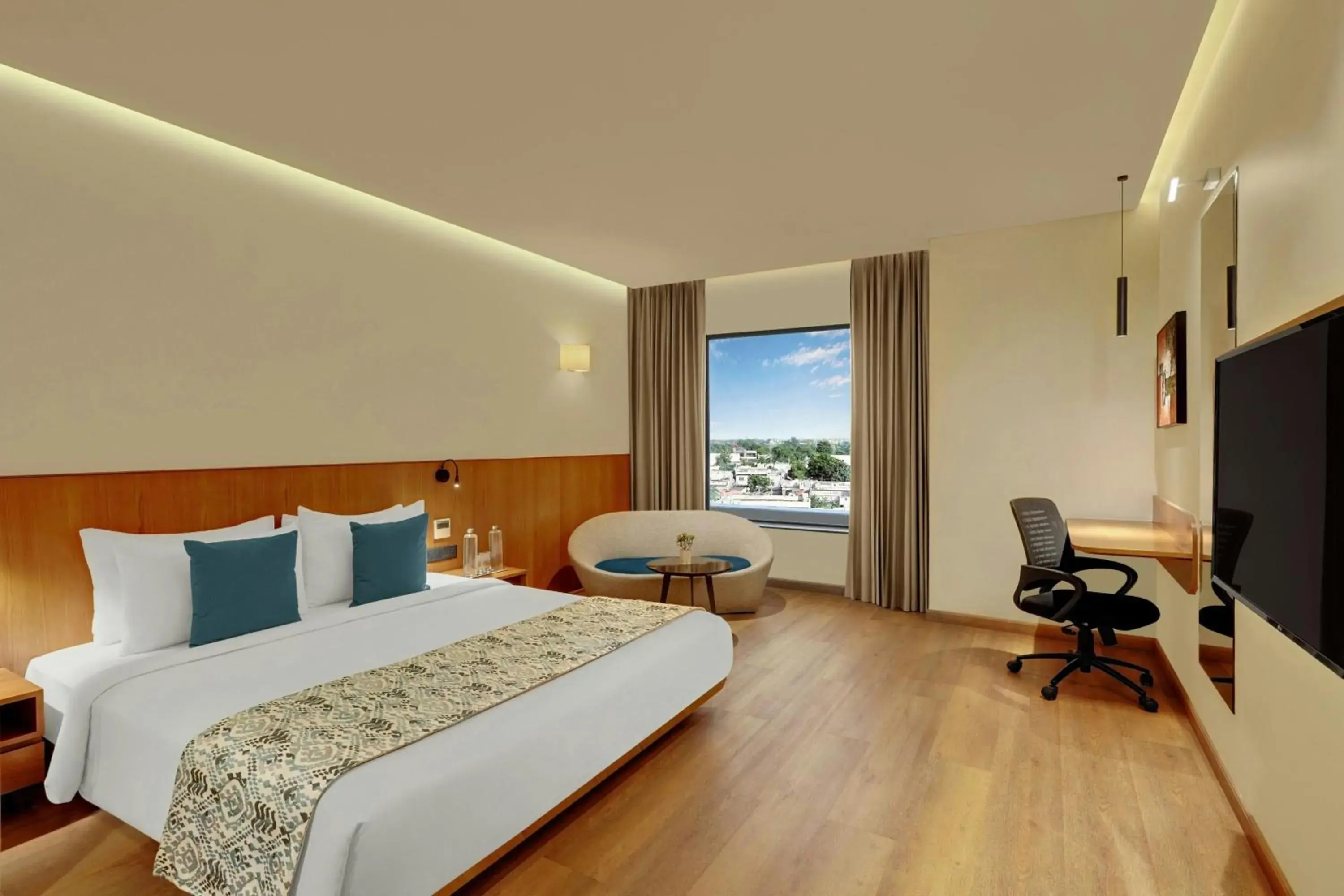 Photo of the whole room, Bed in The Fern Residency, Jamnagar, Series by Marriott Photo of the whole room, Bed in The Fern Residency, Jamnagar, Series by Marriott