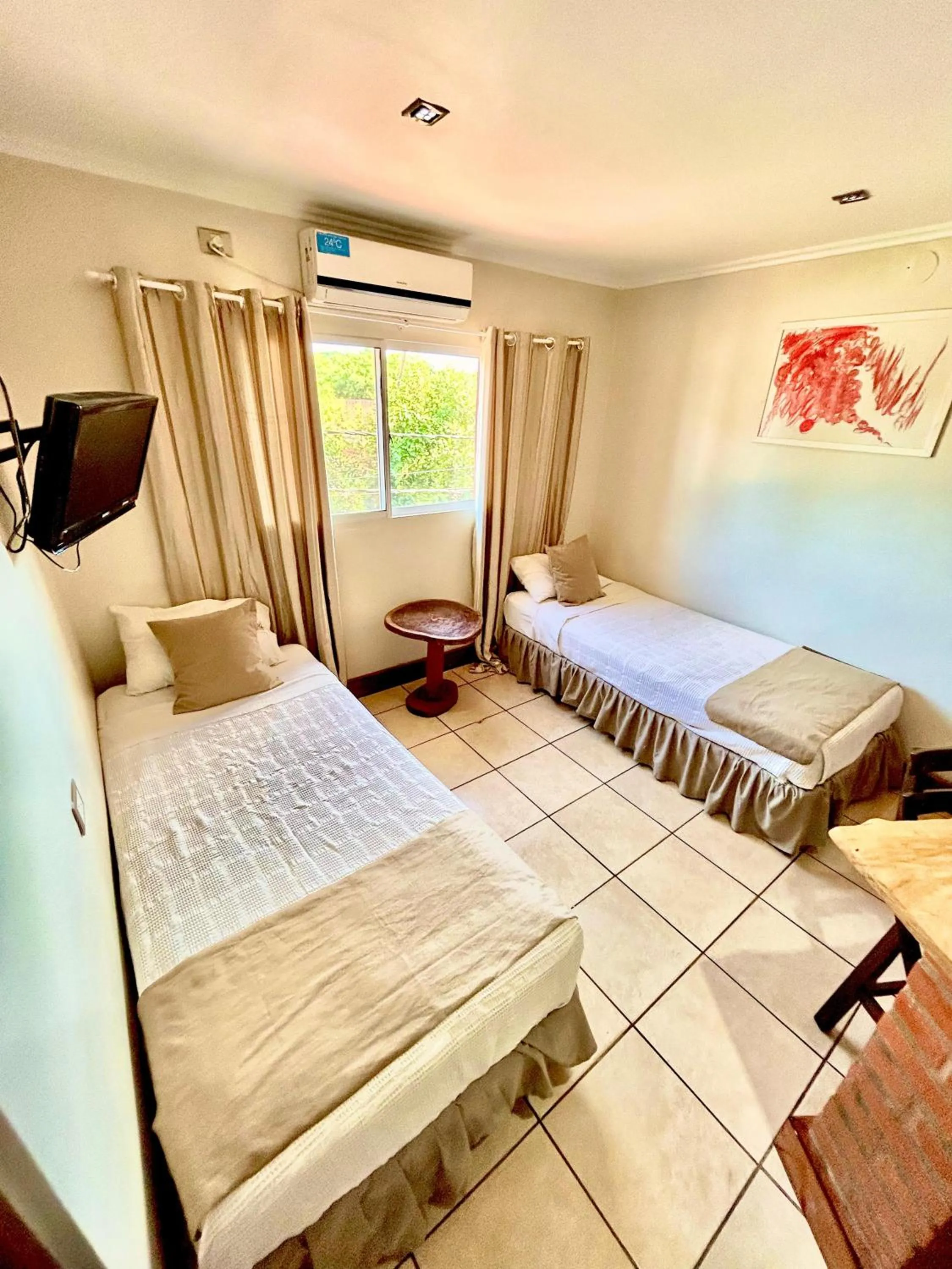 Bed in Tupa Hotel Iguazu