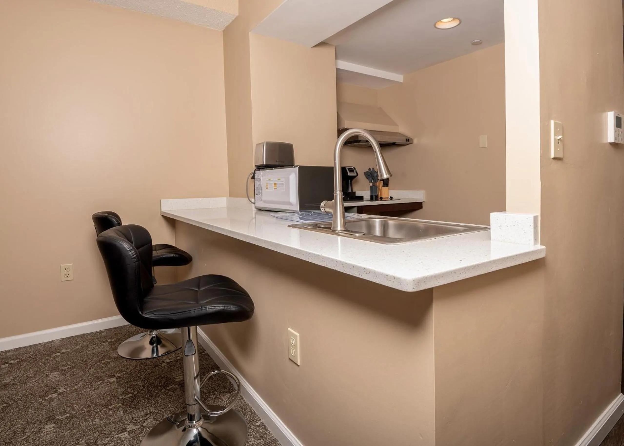 Kitchen or kitchenette in The Americus Hotel, Trademark Collection by Wyndham