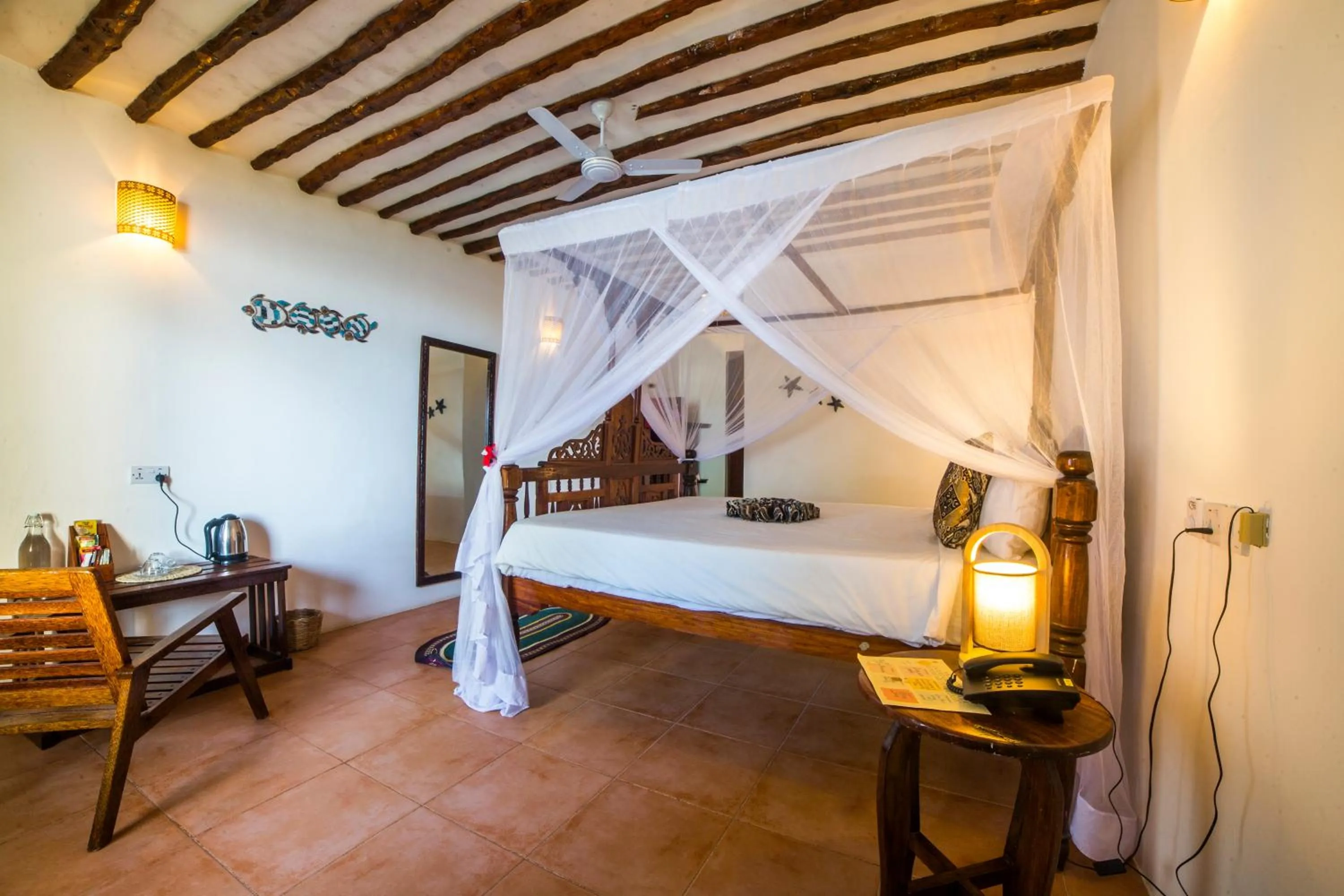 Bed in Antonio Beach Tree House Hotel & Spa