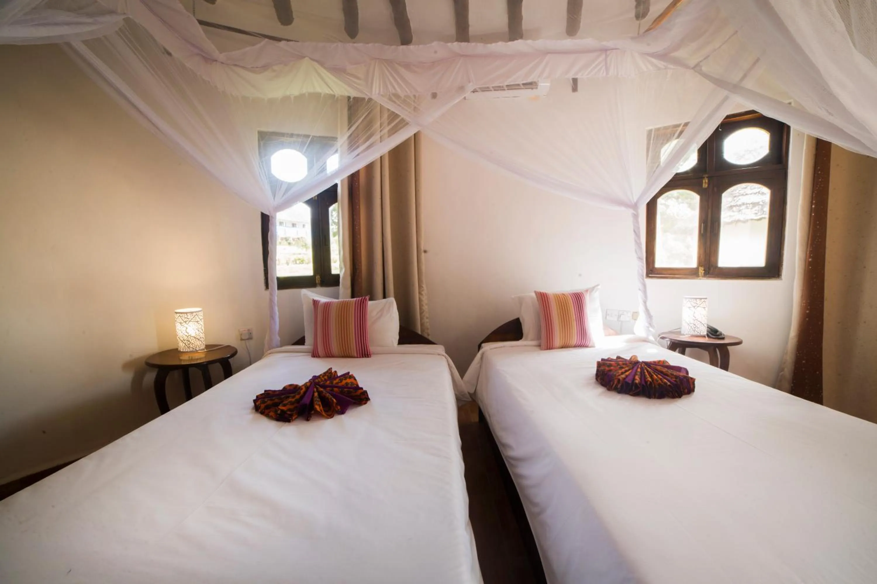 Bed in Antonio Beach Tree House Hotel & Spa