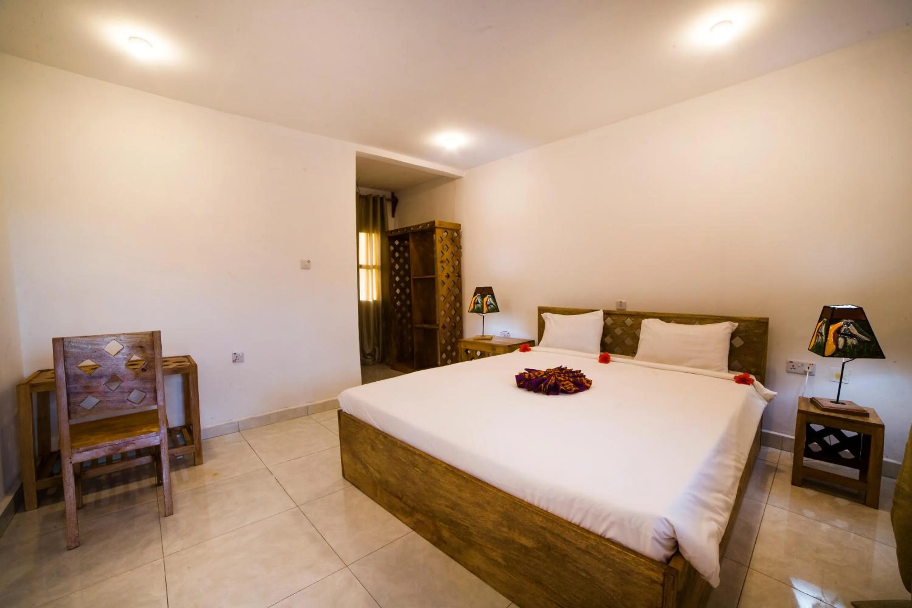 Bed in Antonio Beach Tree House Hotel & Spa