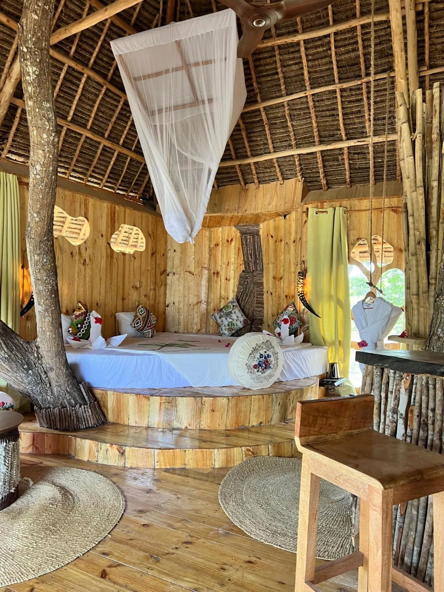 Bed in Antonio Beach Tree House Hotel & Spa