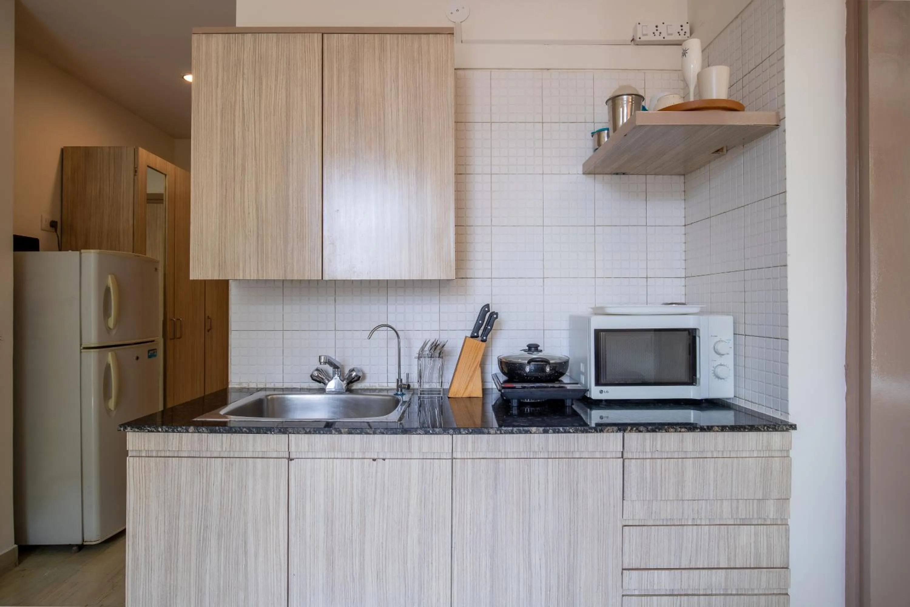 Kitchen or kitchenette in BedChambers Serviced Apartments, Sector 40