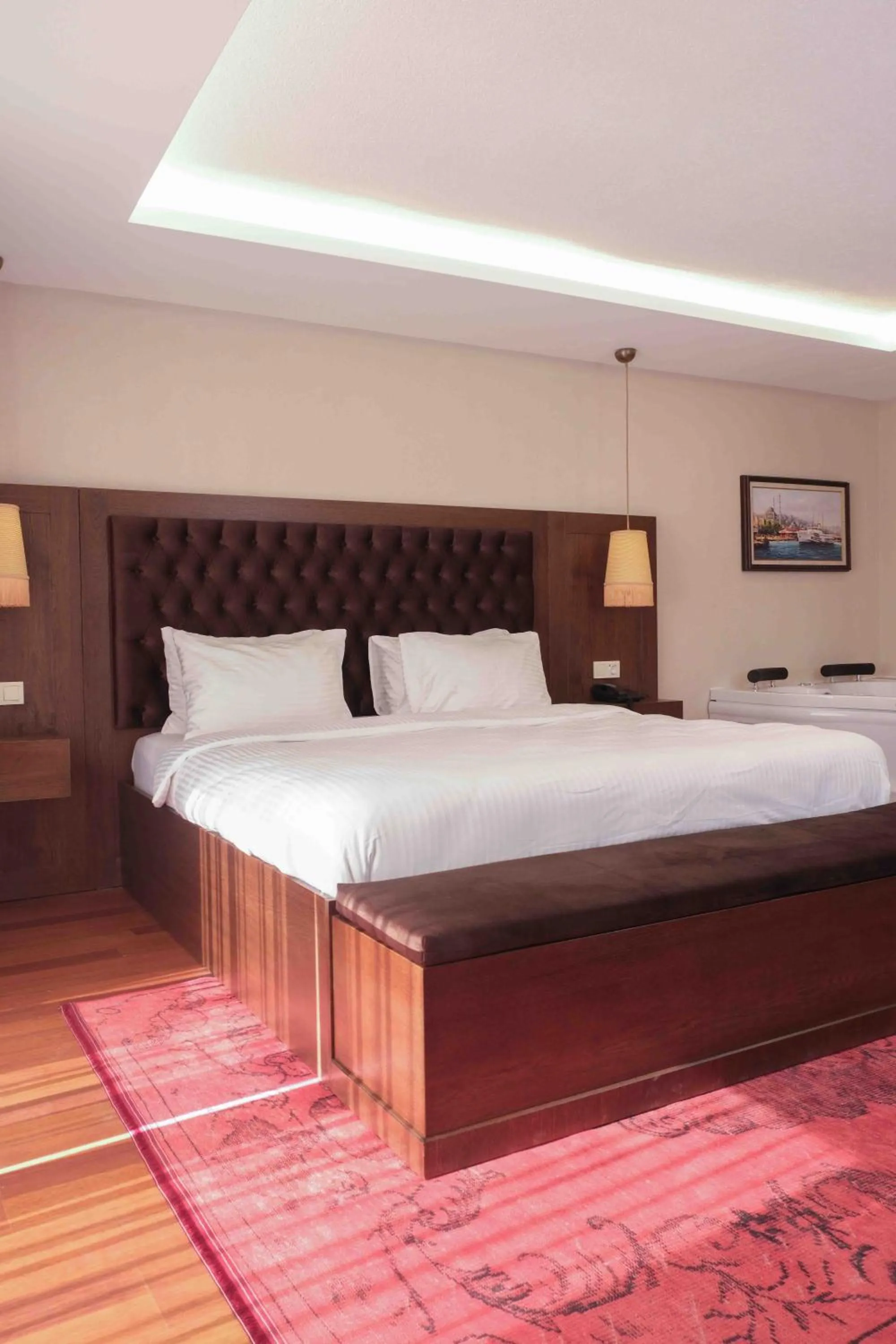 Bed in Phellos Suites Boutique Hotel