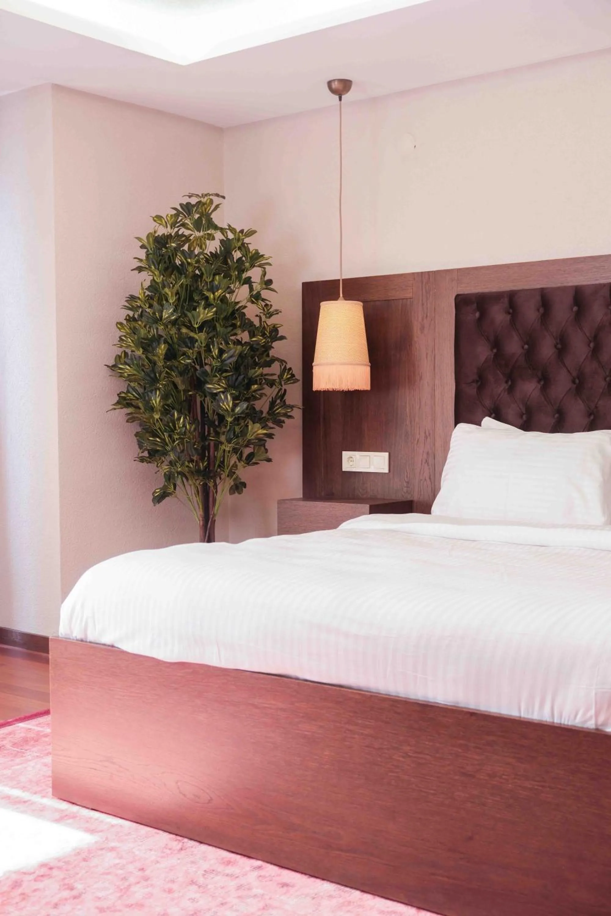 Bed in Phellos Suites Boutique Hotel