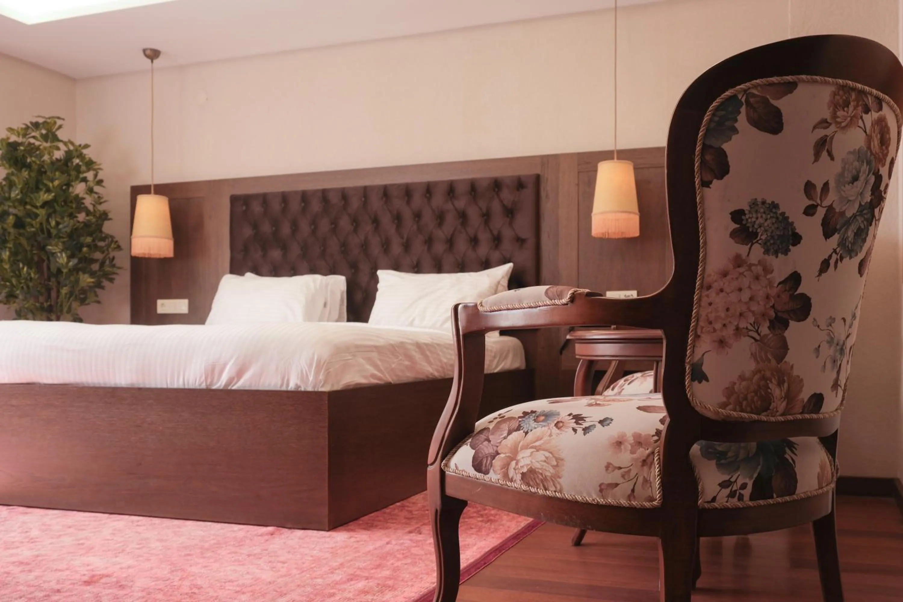 Bed in Phellos Suites Boutique Hotel