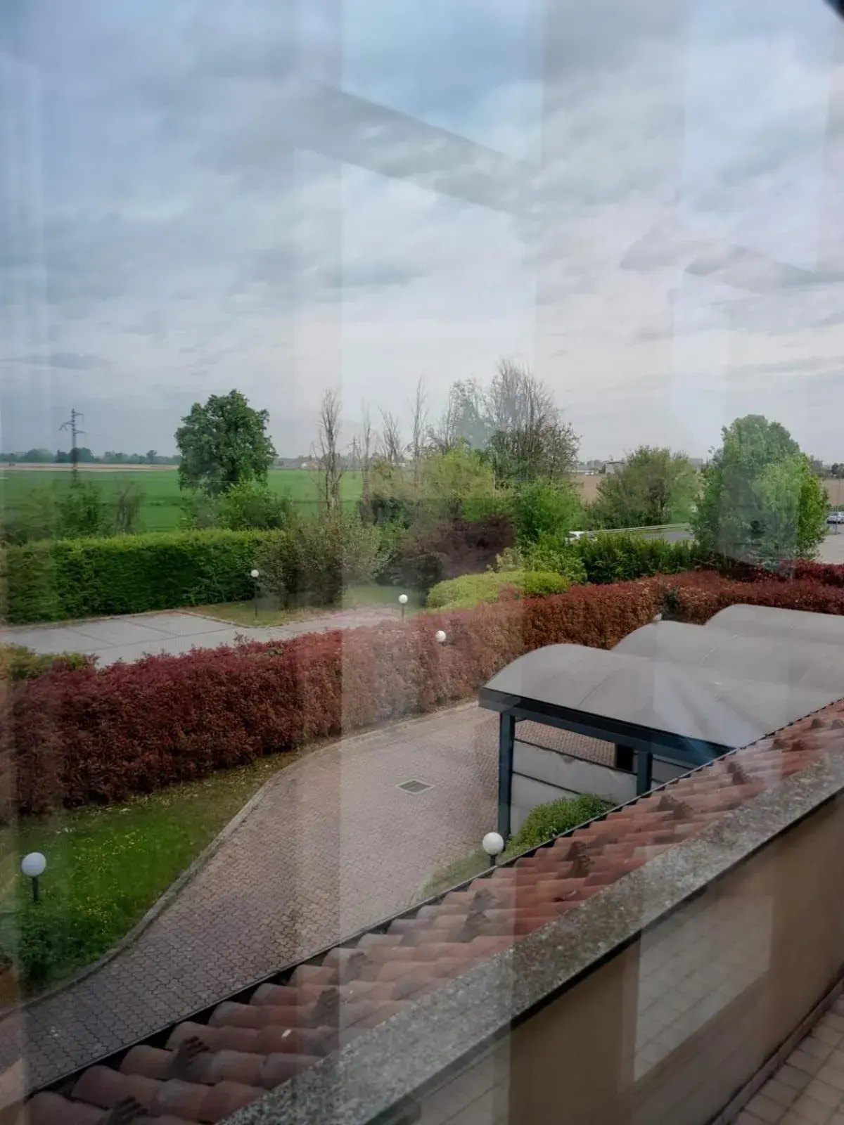 Basic Triple Room in Elysium Hotel Raya Basic Triple Room in Elysium Hotel Raya