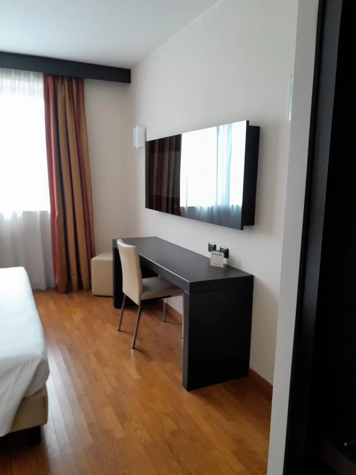 Bed in Elysium Hotel Raya