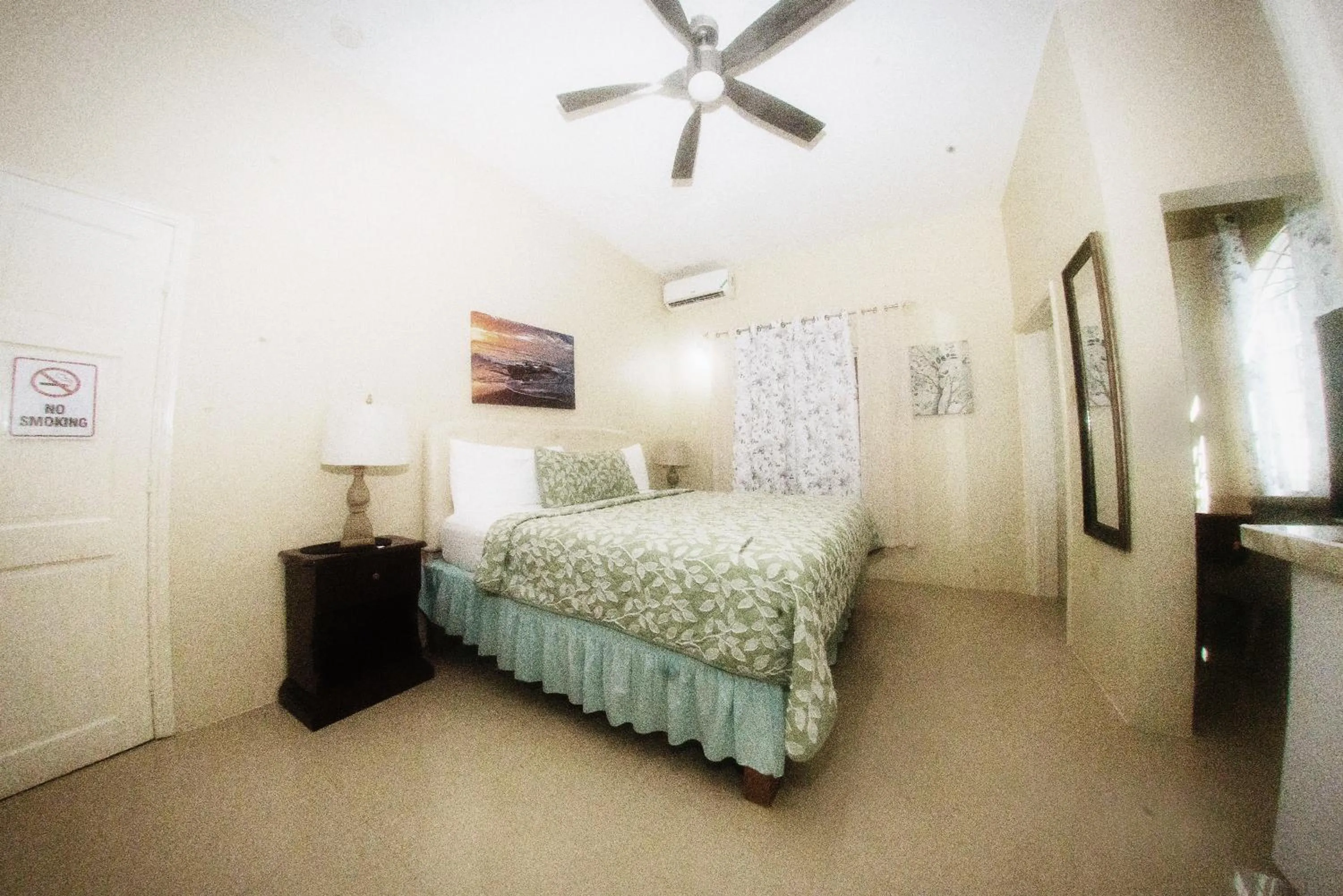 Bed in Dela de-Rose Guest House Negril Jamaica