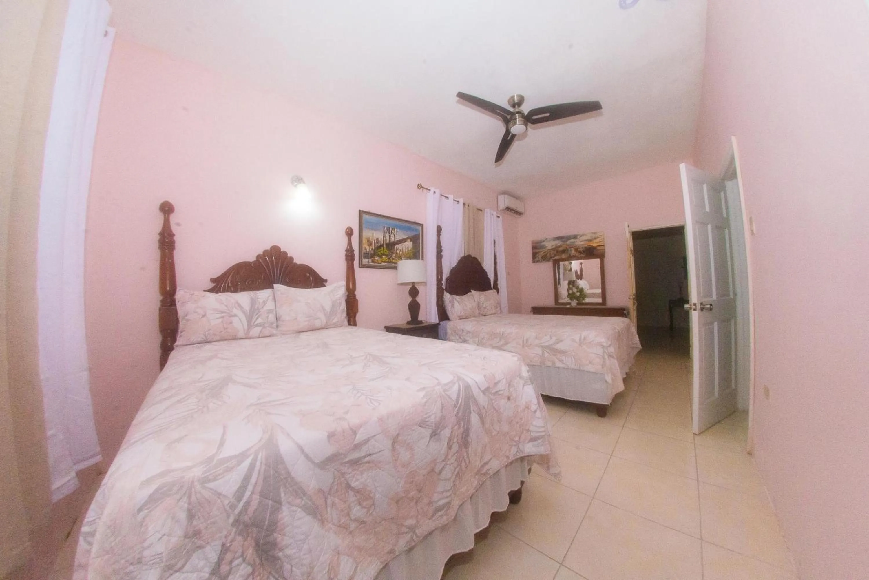 Bedroom, Bed in Dela de-Rose Guest House Negril Jamaica