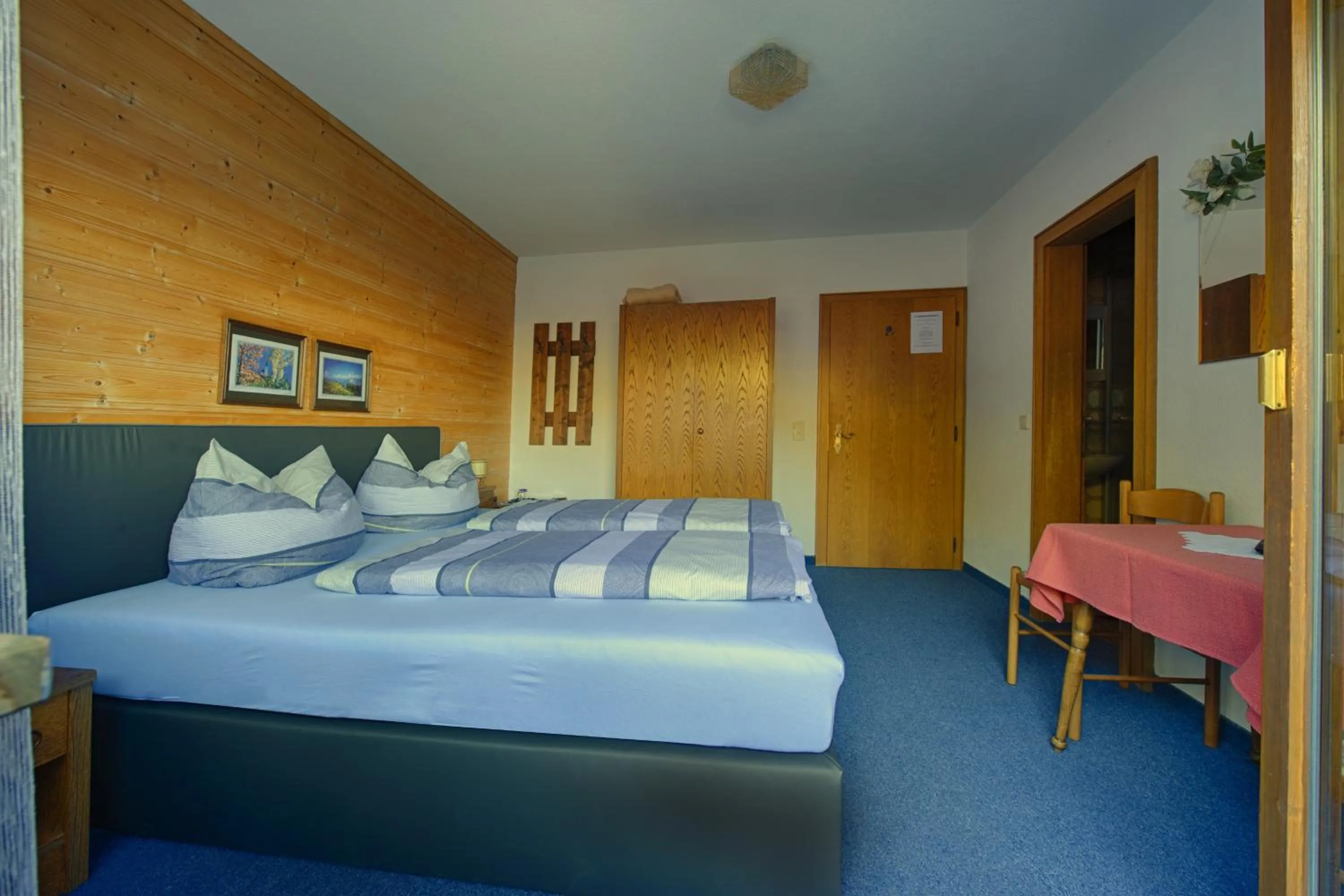 Photo of the whole room, Bed in Garni Fischer