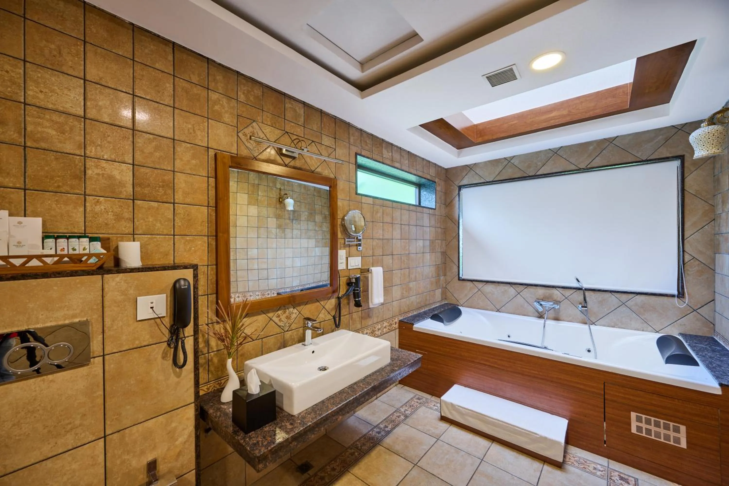 Bathroom, Bed in Gokulam Grand Resort & Spa, Kumarakom