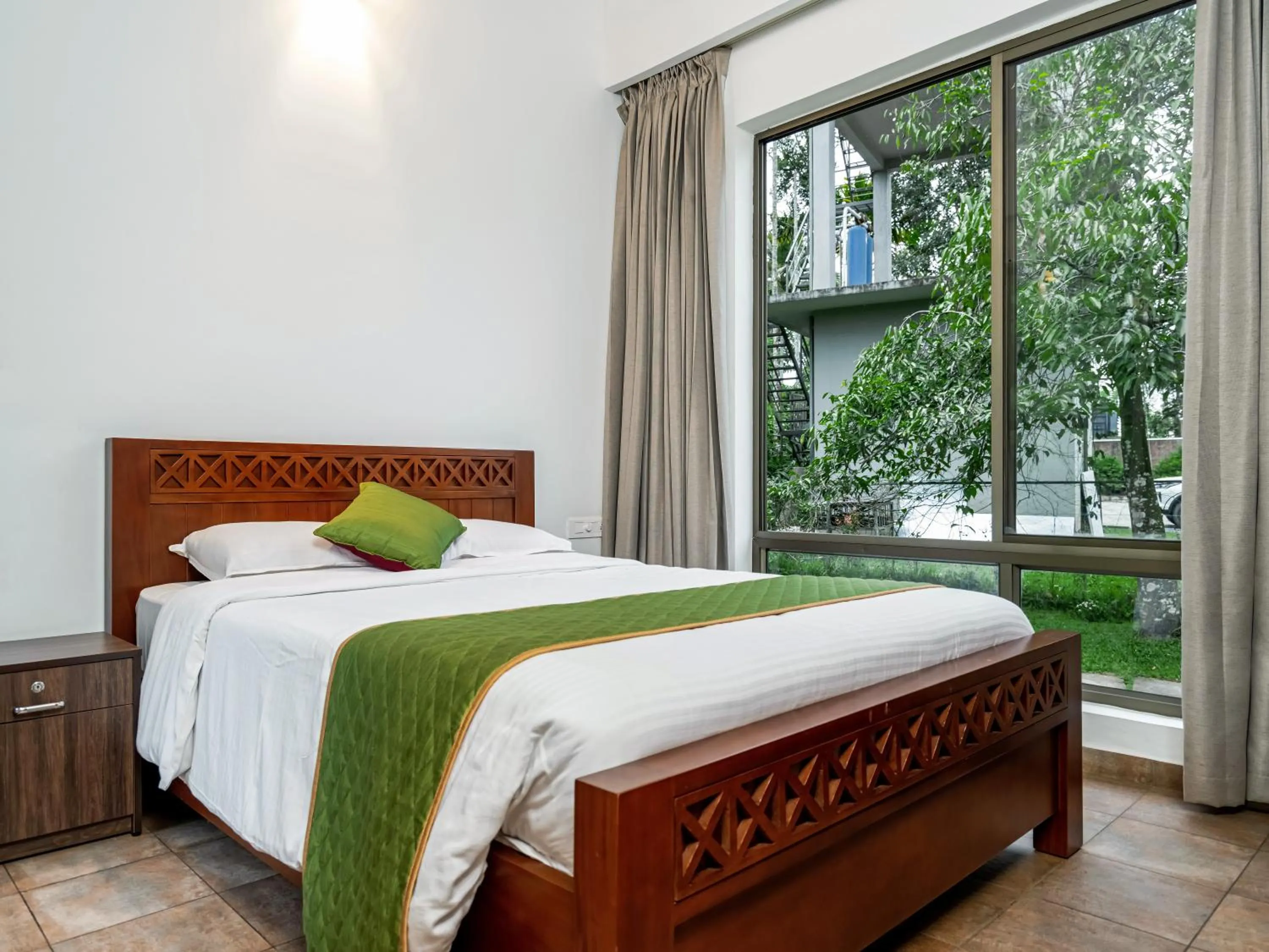 Bed in Coffee Greens Resort