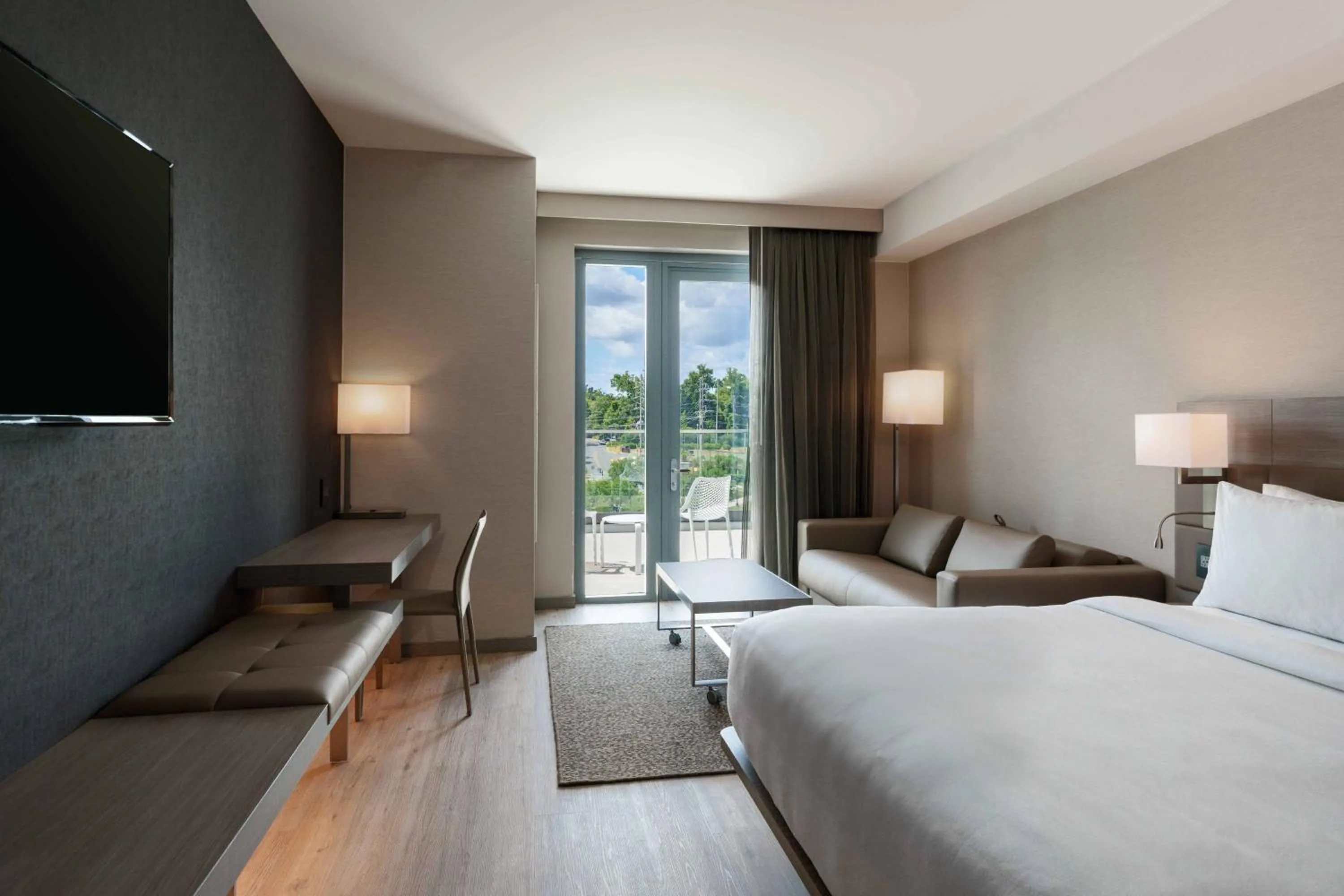 Photo of the whole room, Bed in AC Hotel by Marriott Tallahassee Universities at the Capitol