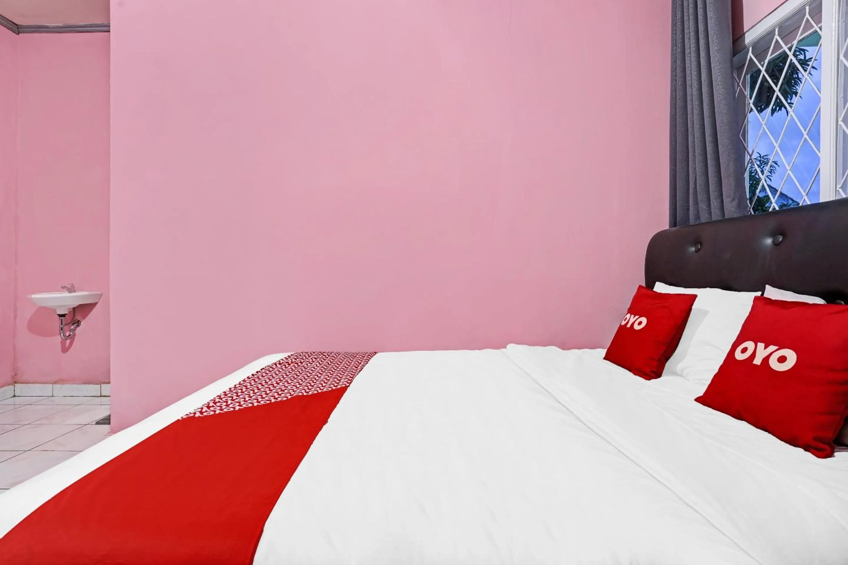 Bedroom in OYO 90289 Lestari Syariah Homestay