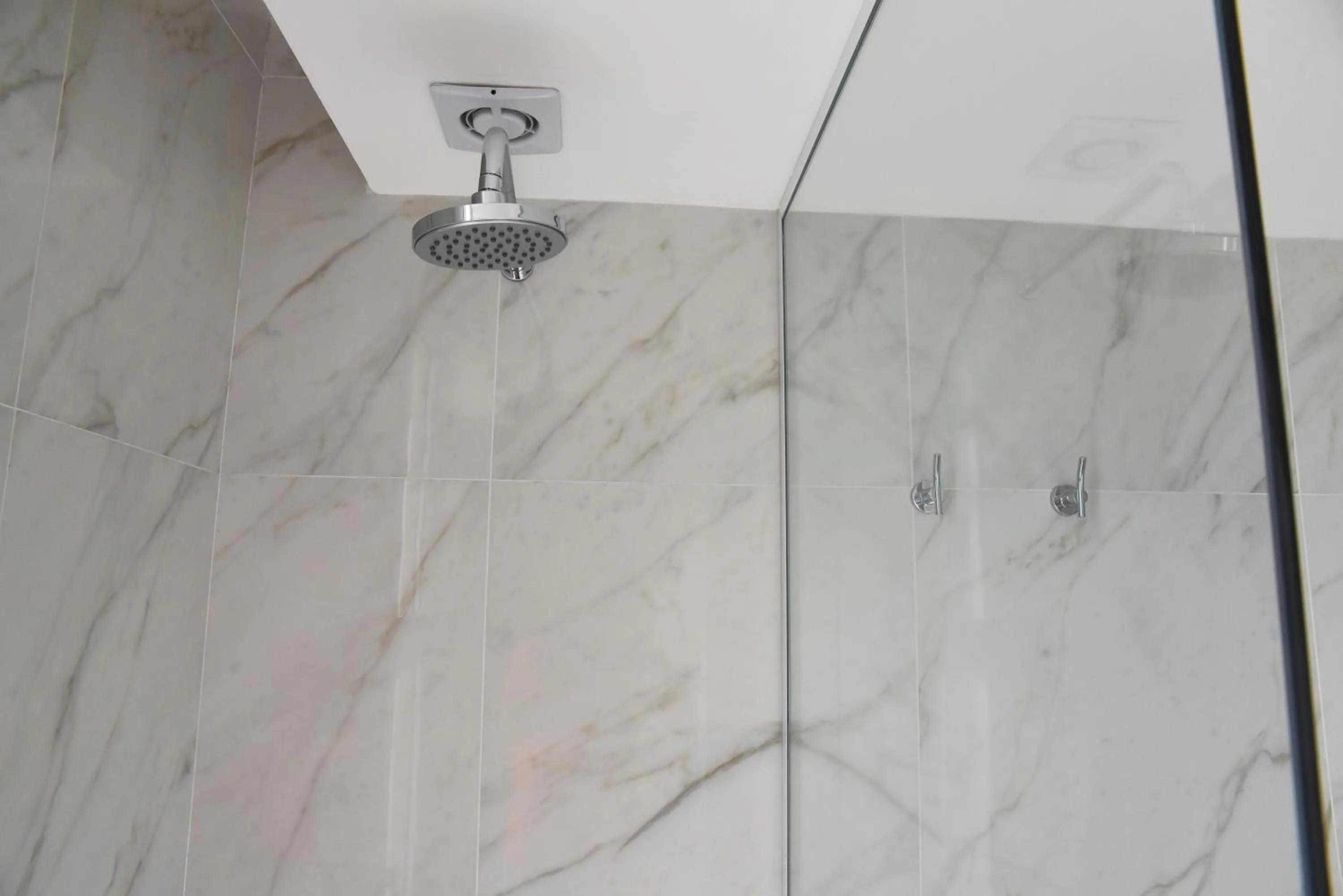 Shower in Hotel Soho Suites