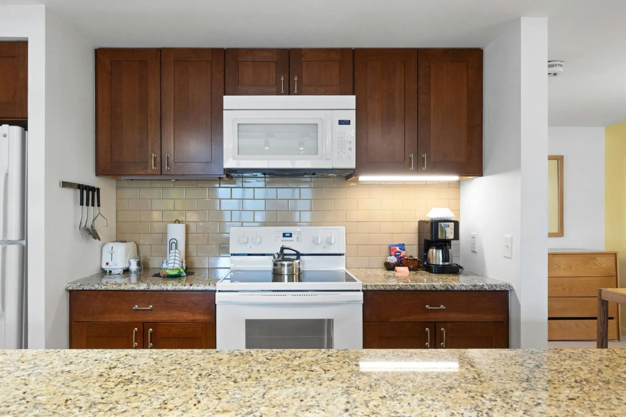 Communal kitchen in Aspen Ridge Condominiums by Vail Resorts